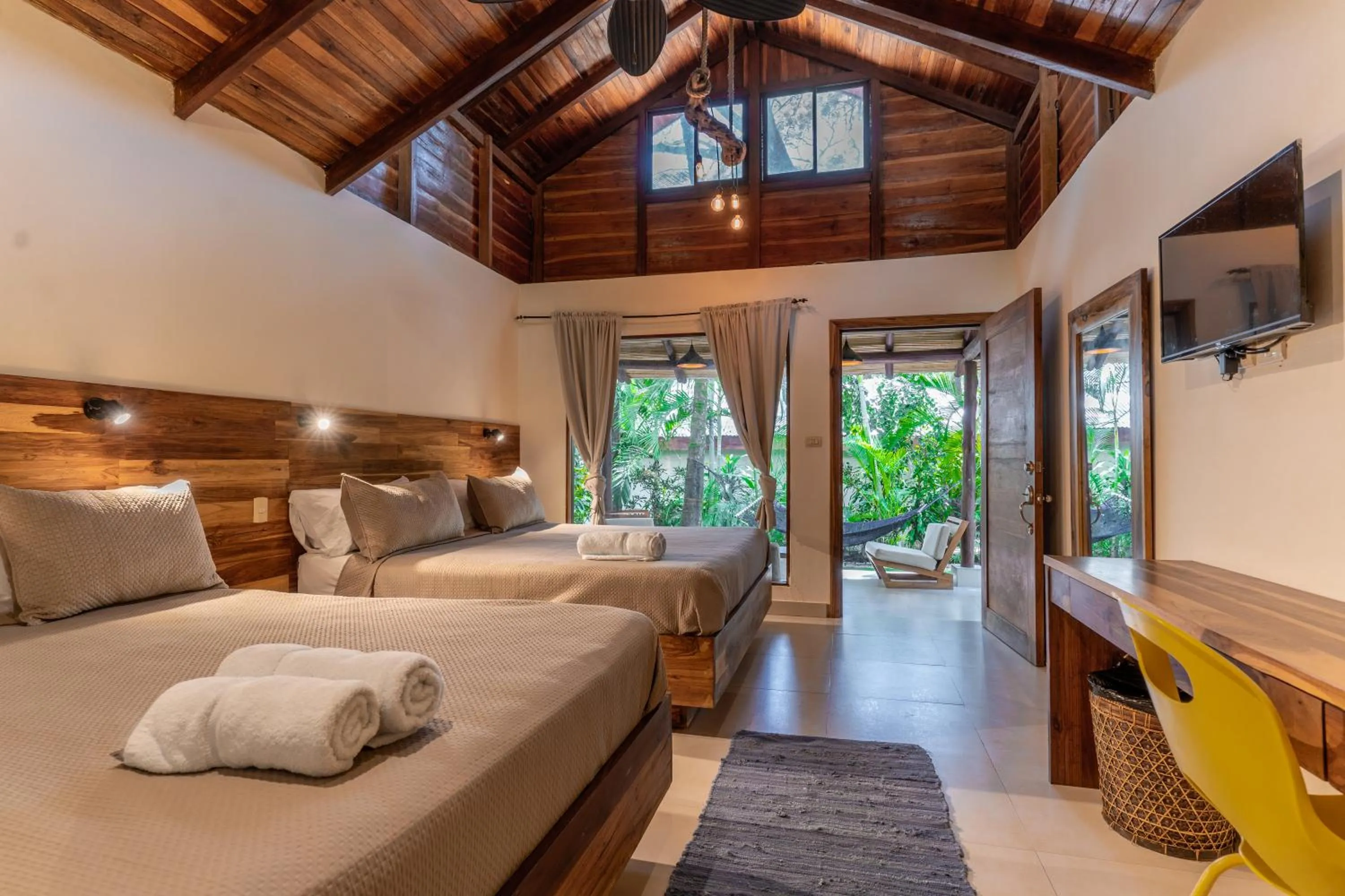 Bed in Banana Beach Bungalows