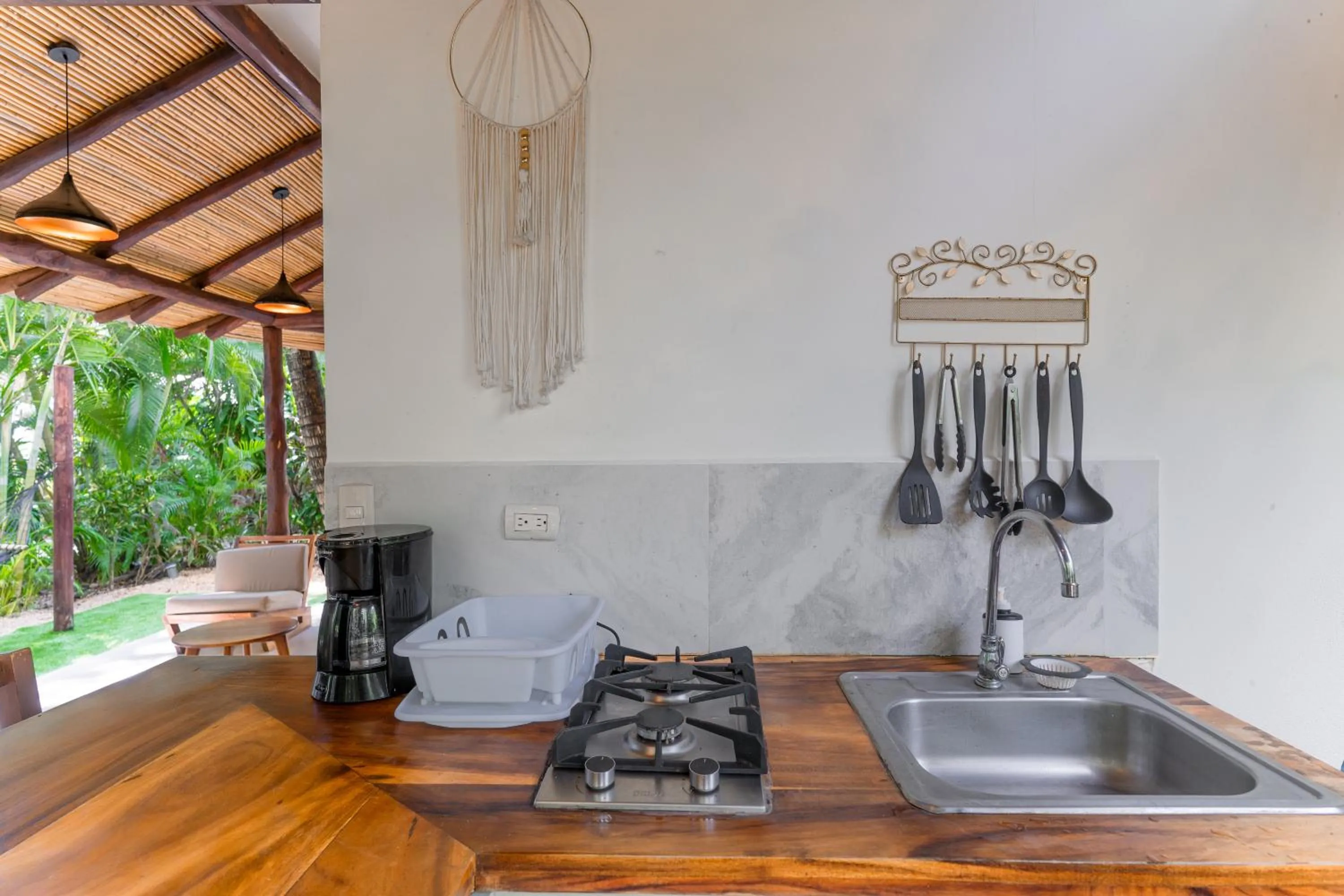 Kitchen or kitchenette in Banana Beach Bungalows