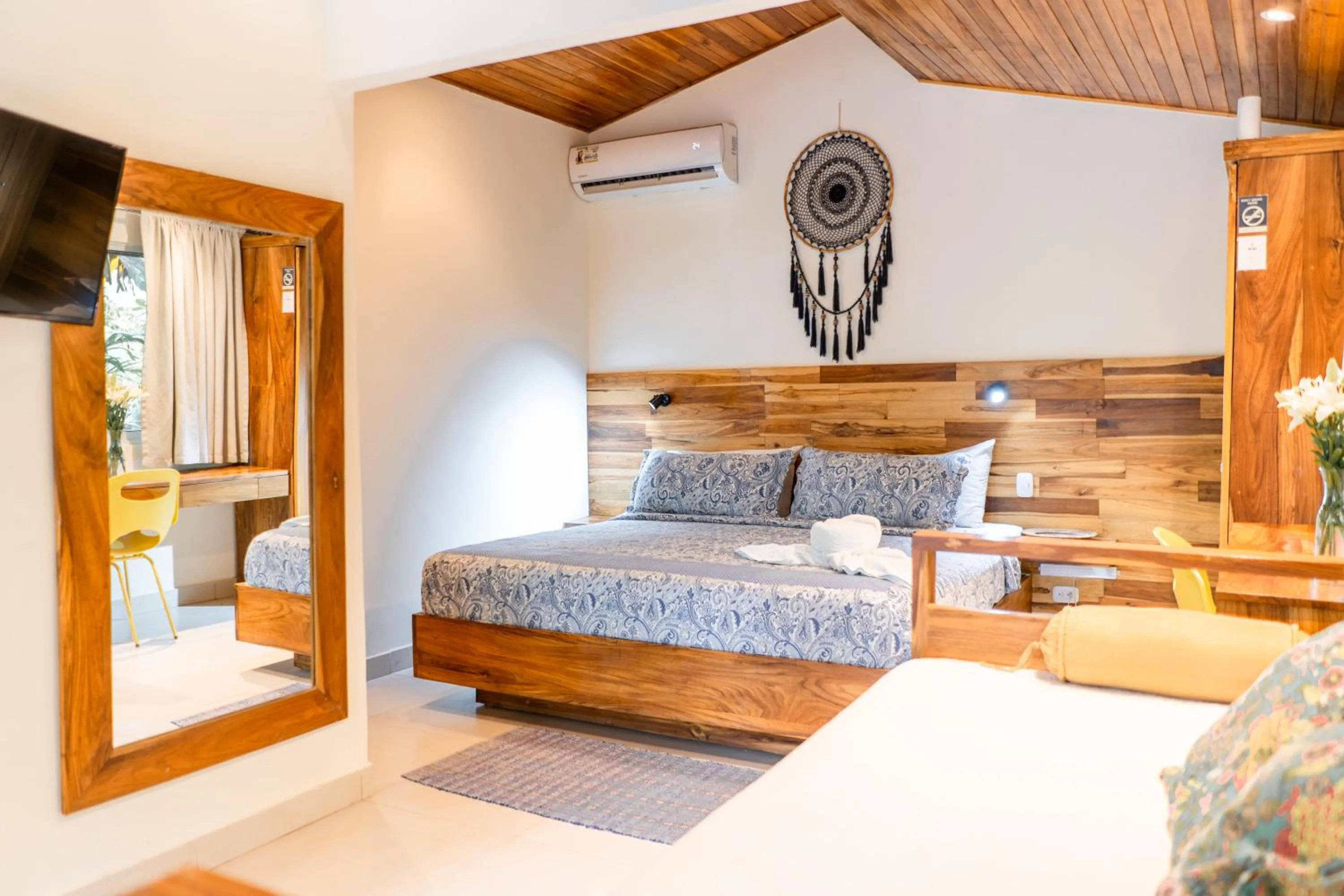 Bed in Banana Beach Bungalows