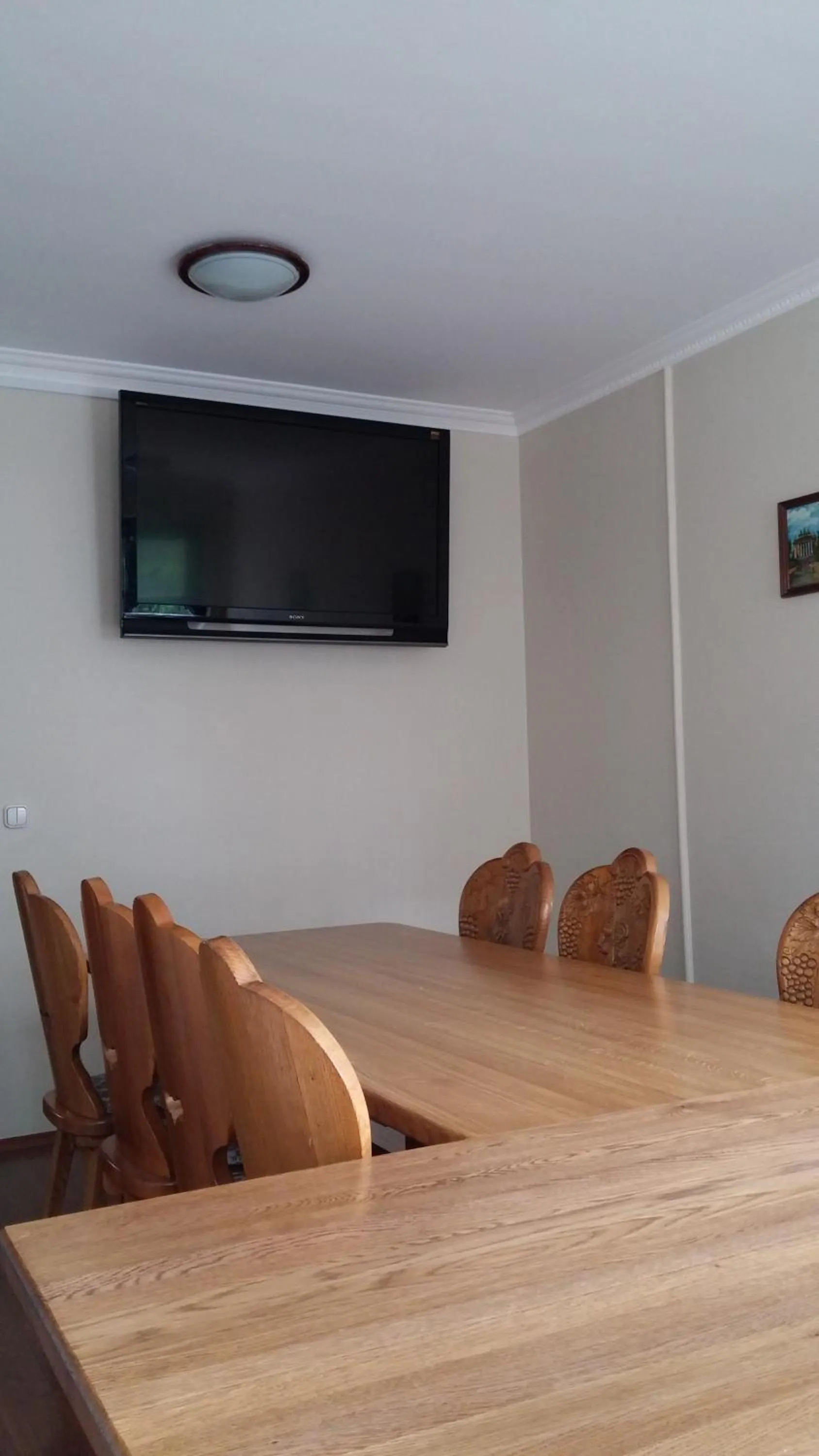 Communal lounge/ TV room in Bacchus Panzió