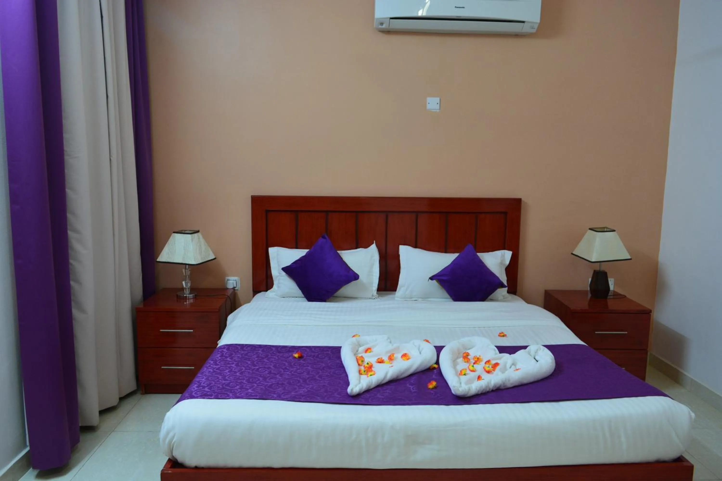 Bed in Al Karam Hotel Apartment