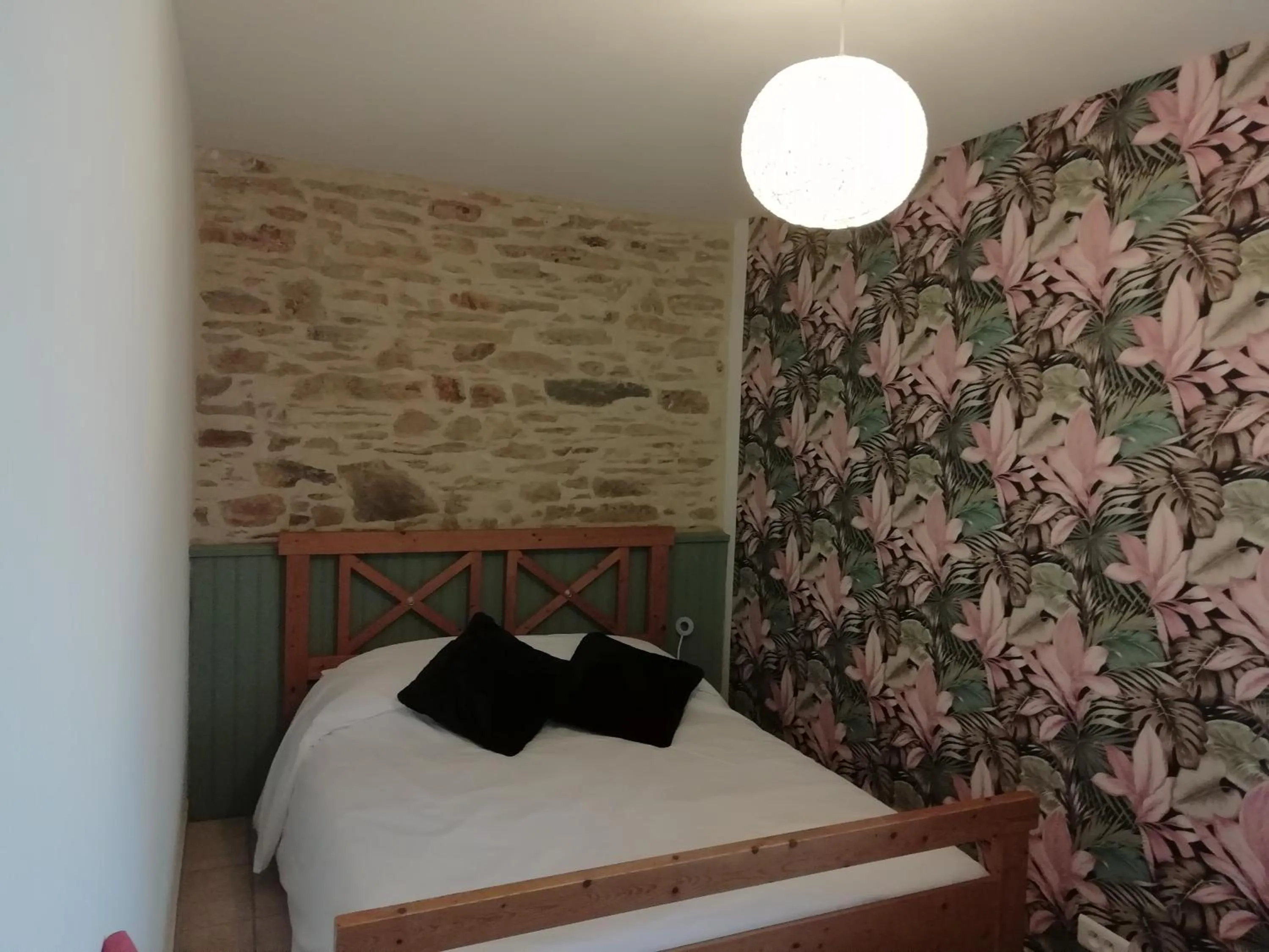 Bed in Les gîtes du petit Marcel