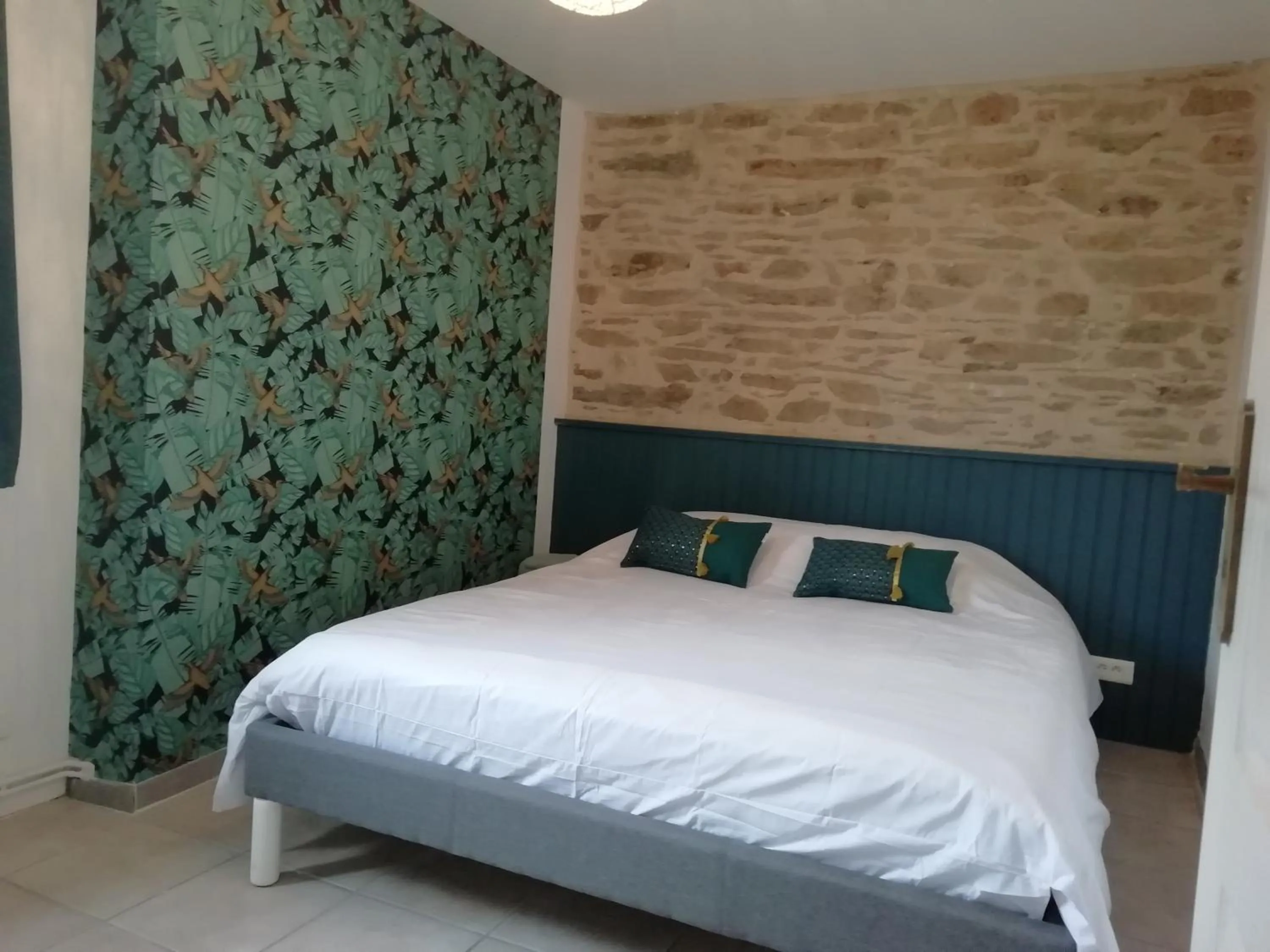 Bed in Les gîtes du petit Marcel
