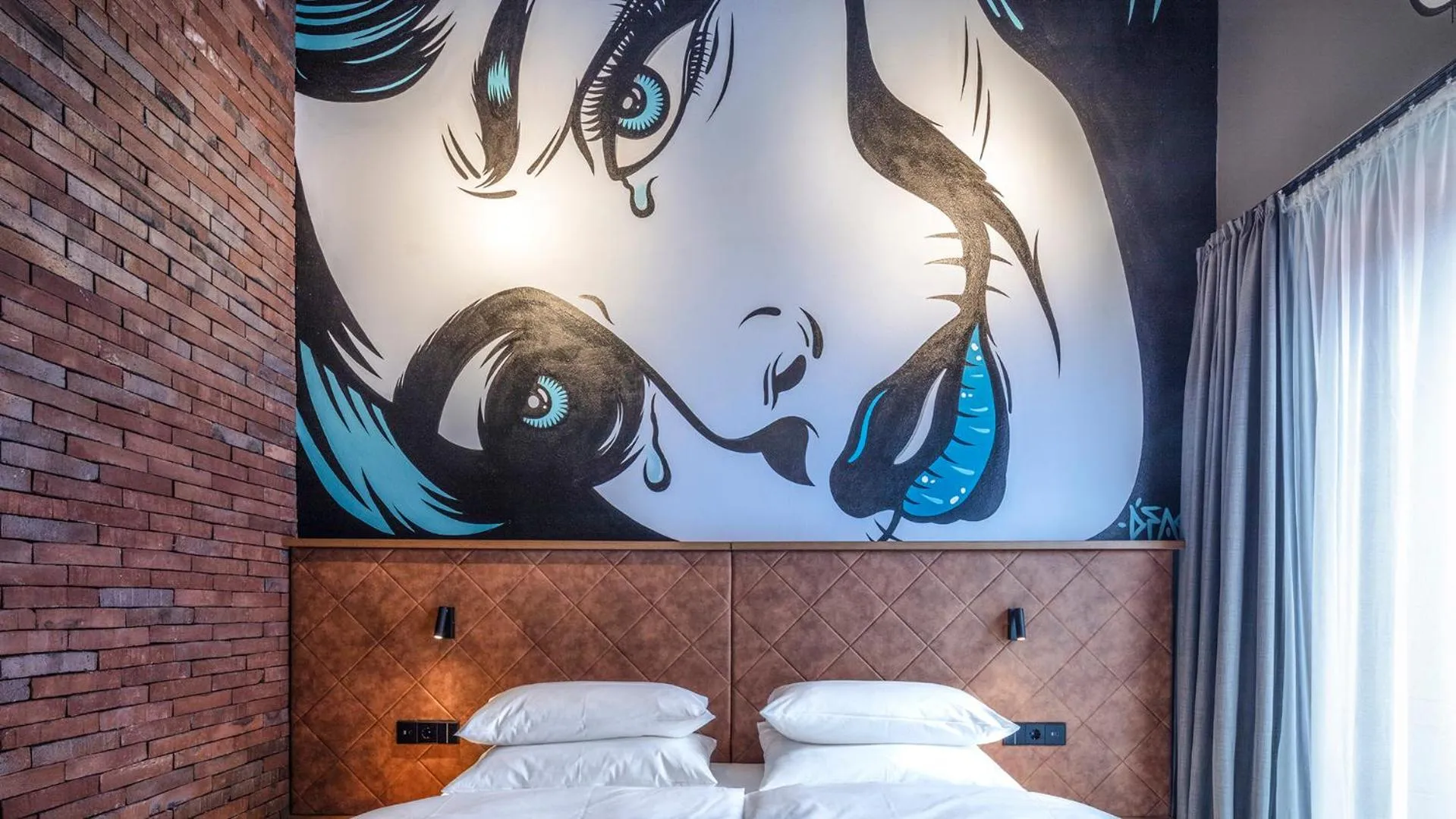 Bed in Liebesbier Urban Art & Smart Hotel