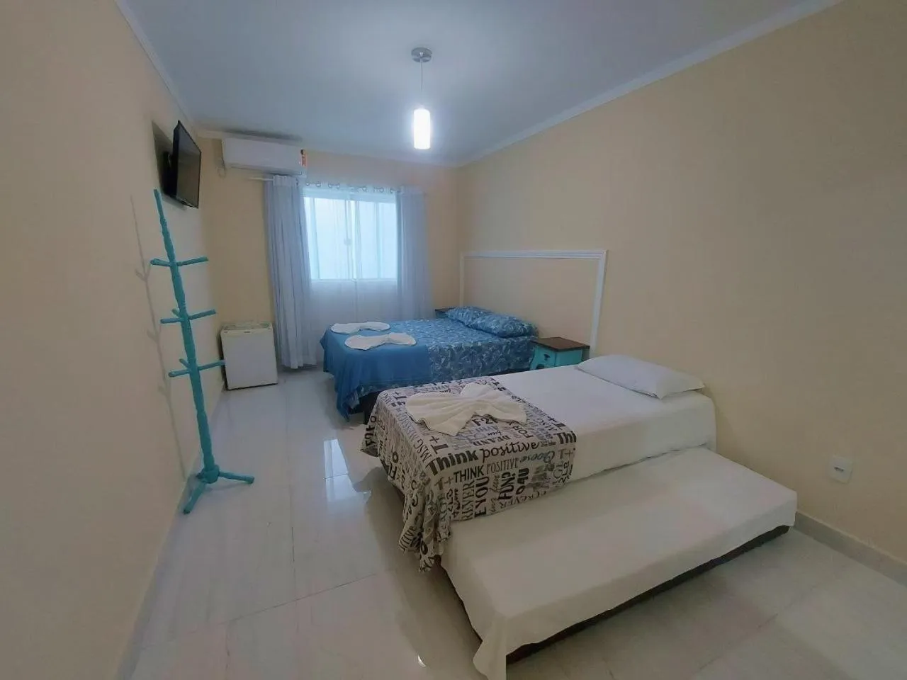 Bed in Pousada Cavalero