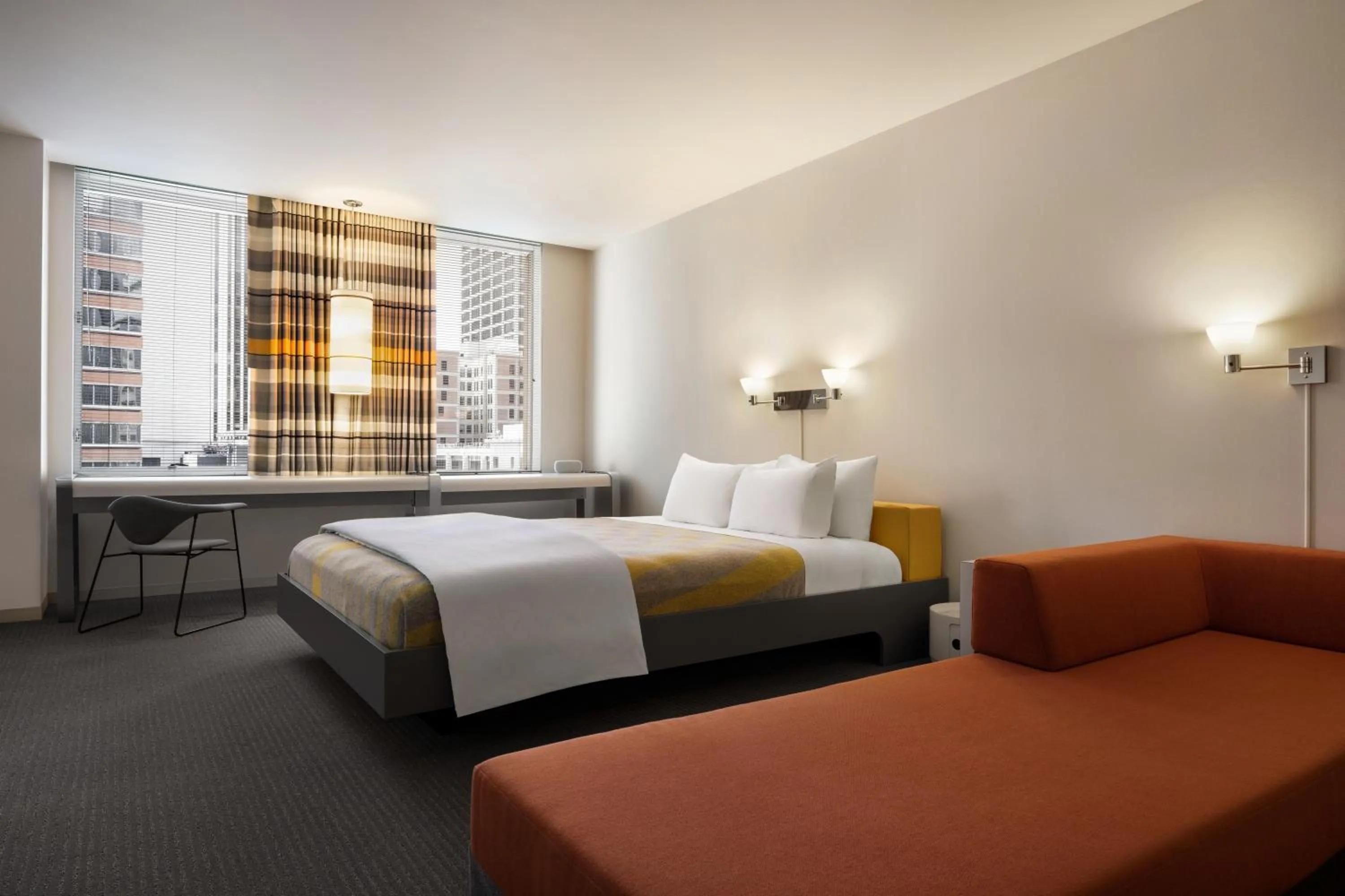 Seating area, Bed in The Delphi Downtown LA