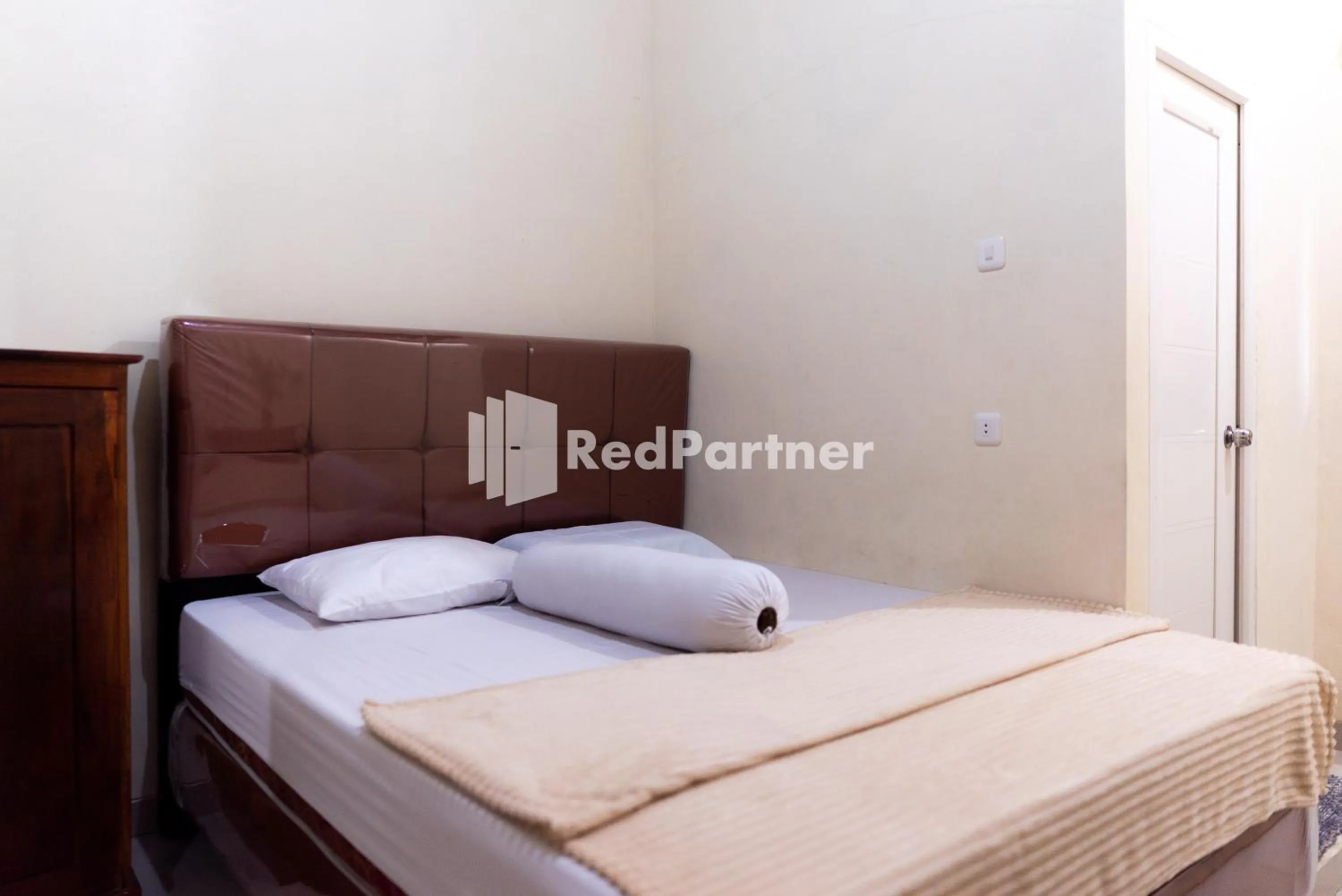 Bedroom in ITR Homestay RedPartner