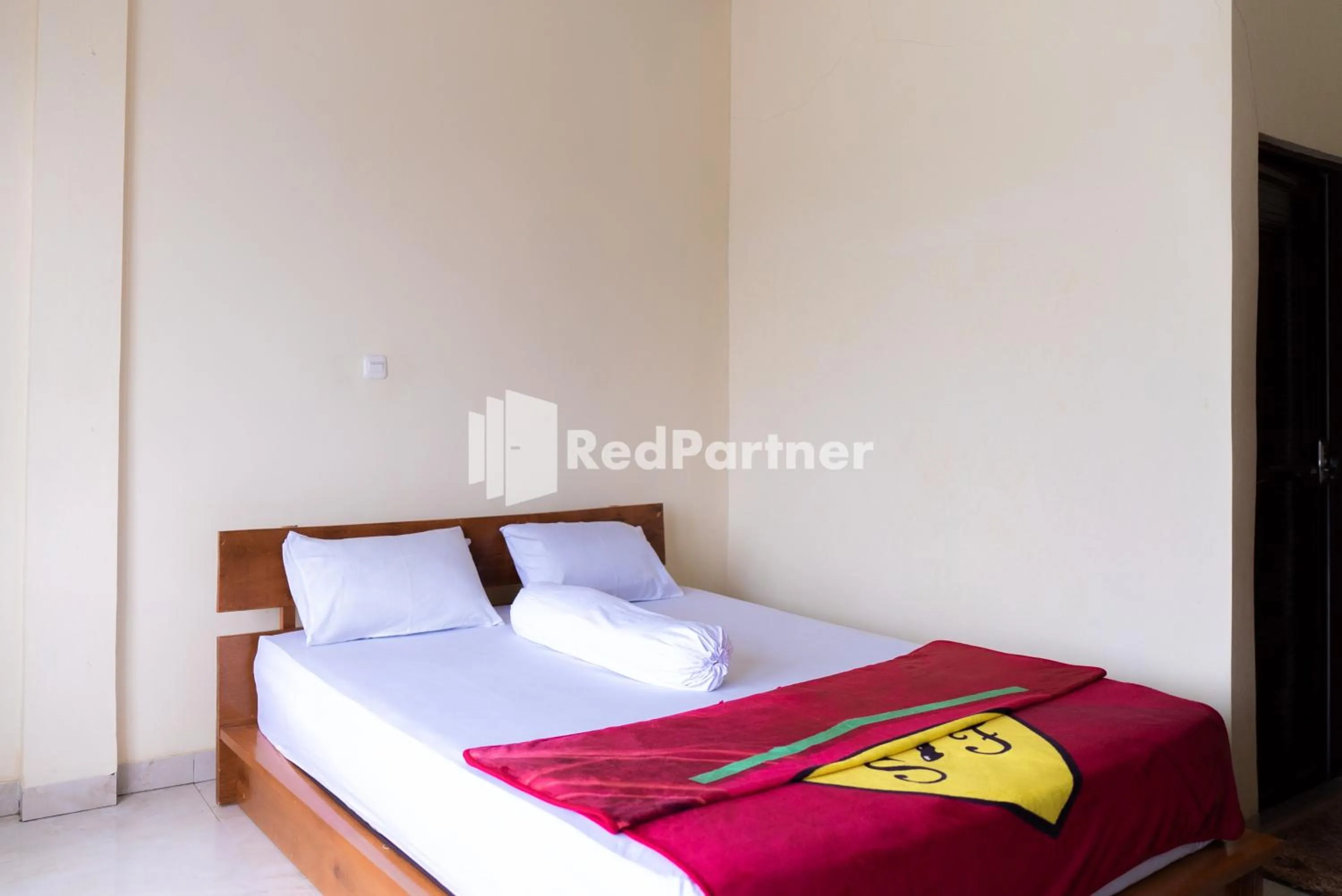 Bedroom in ITR Homestay RedPartner