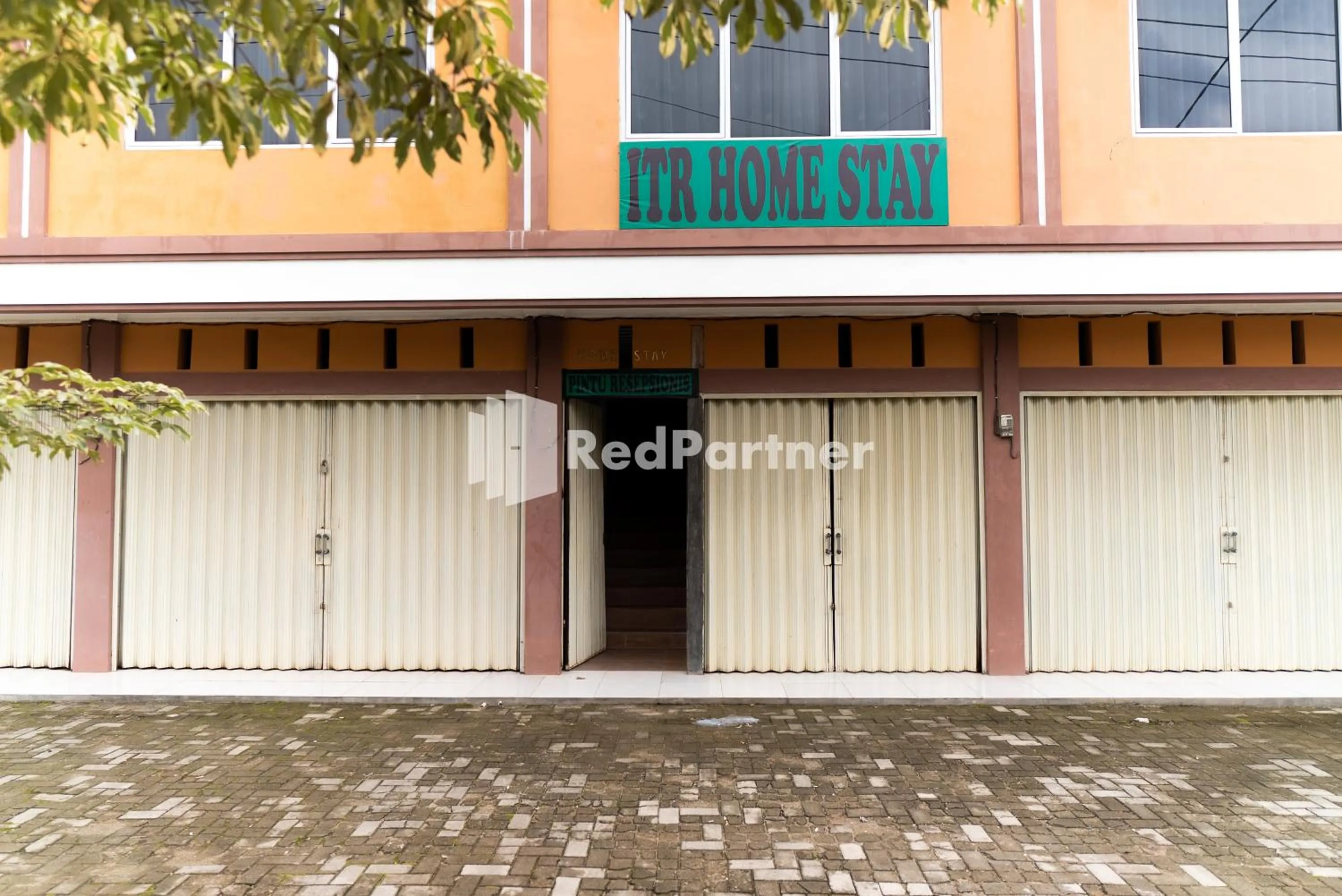 Property logo or sign in ITR Homestay RedPartner