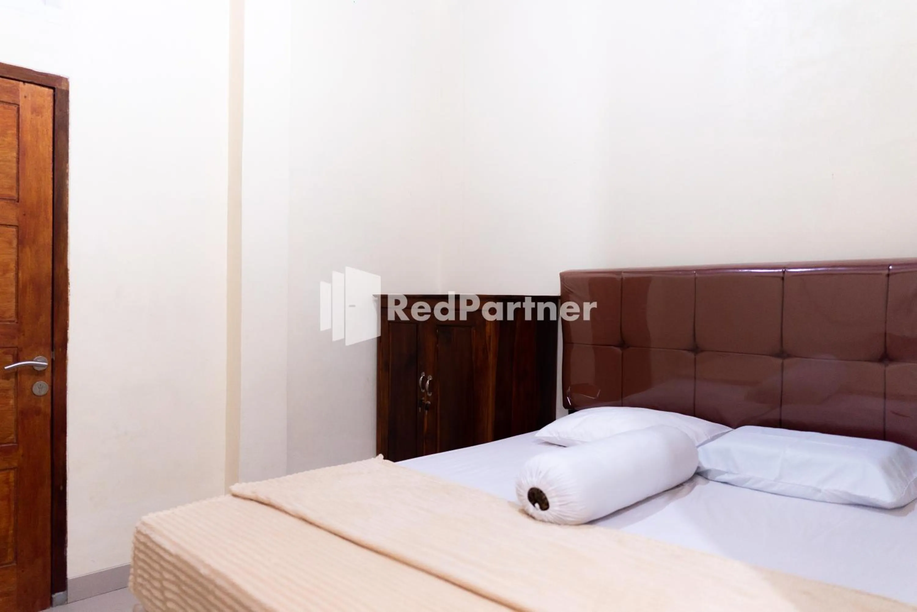 Bedroom in ITR Homestay RedPartner