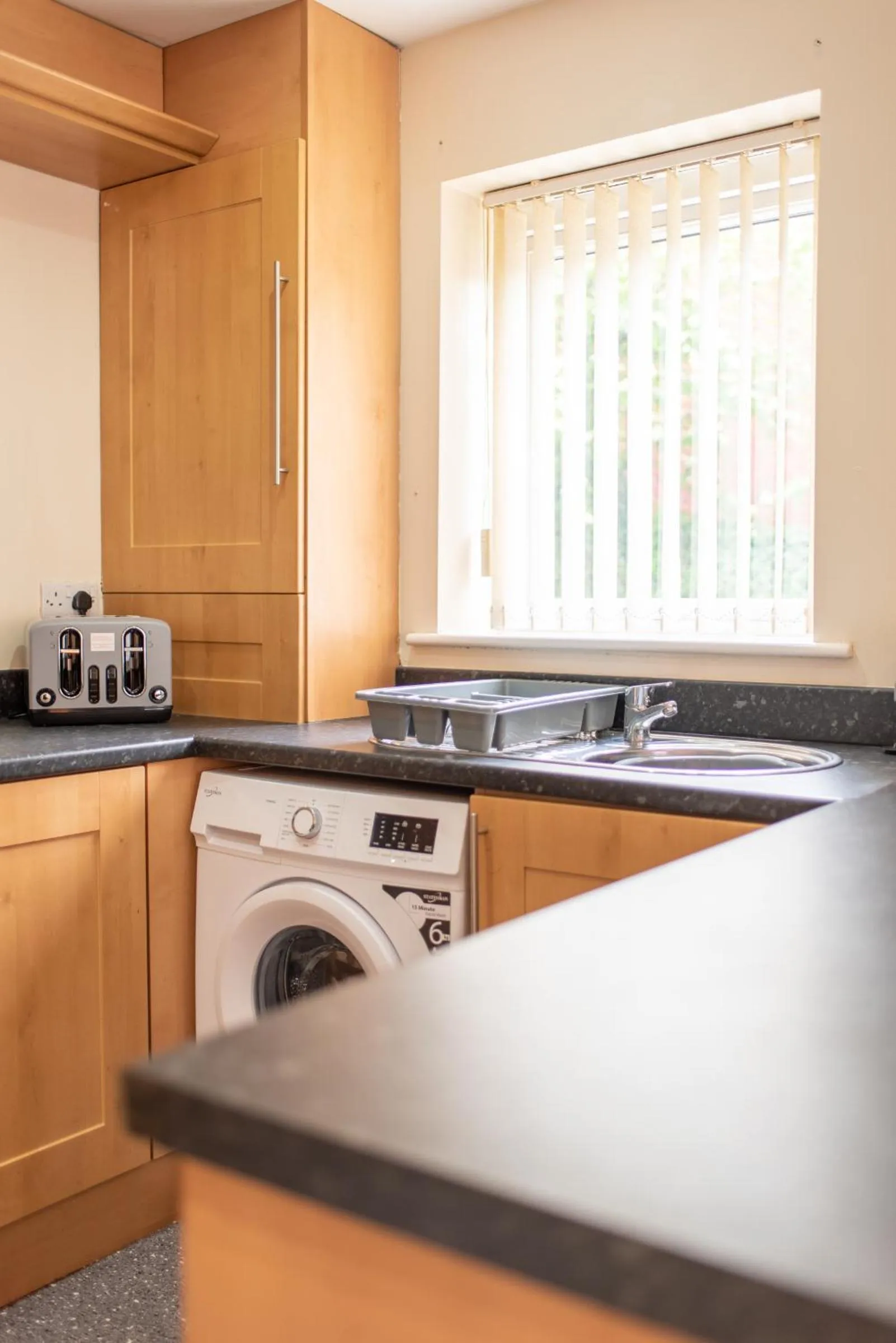 Kitchen or kitchenette in Apartment 10