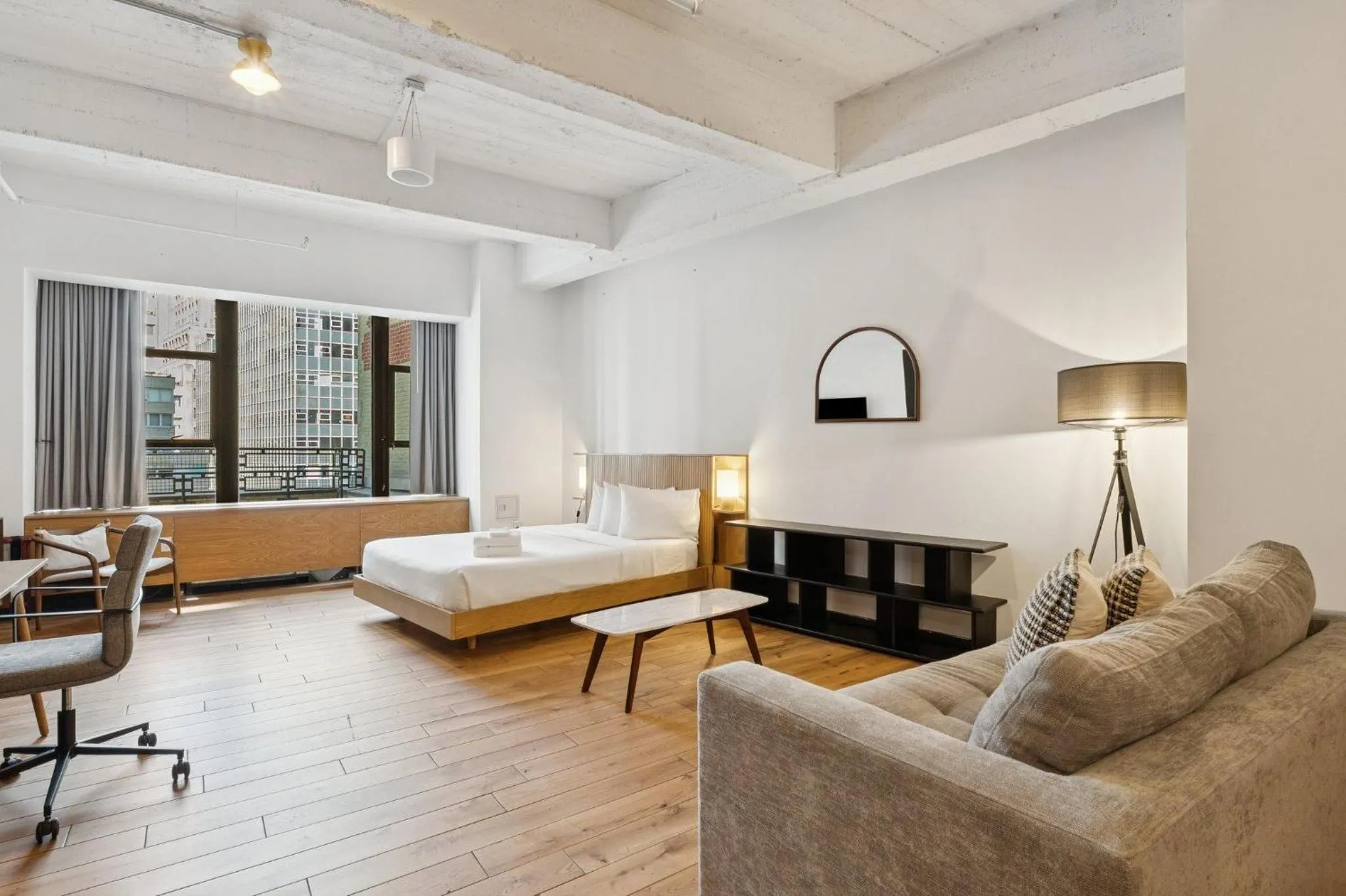Living room, Bed in Placemakr Wall Street