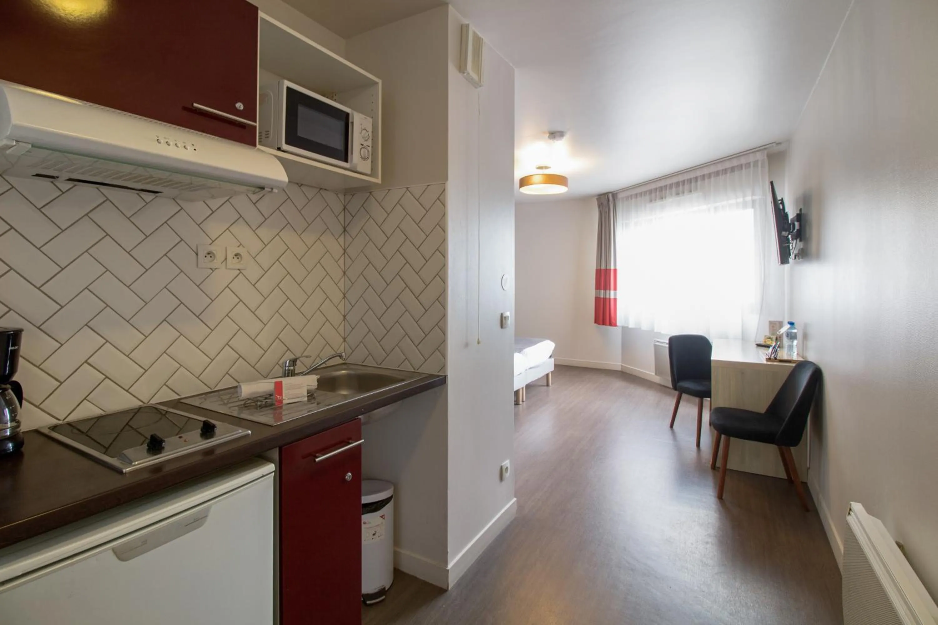 Kitchen or kitchenette in Appart’City Confort Paris Villejuif