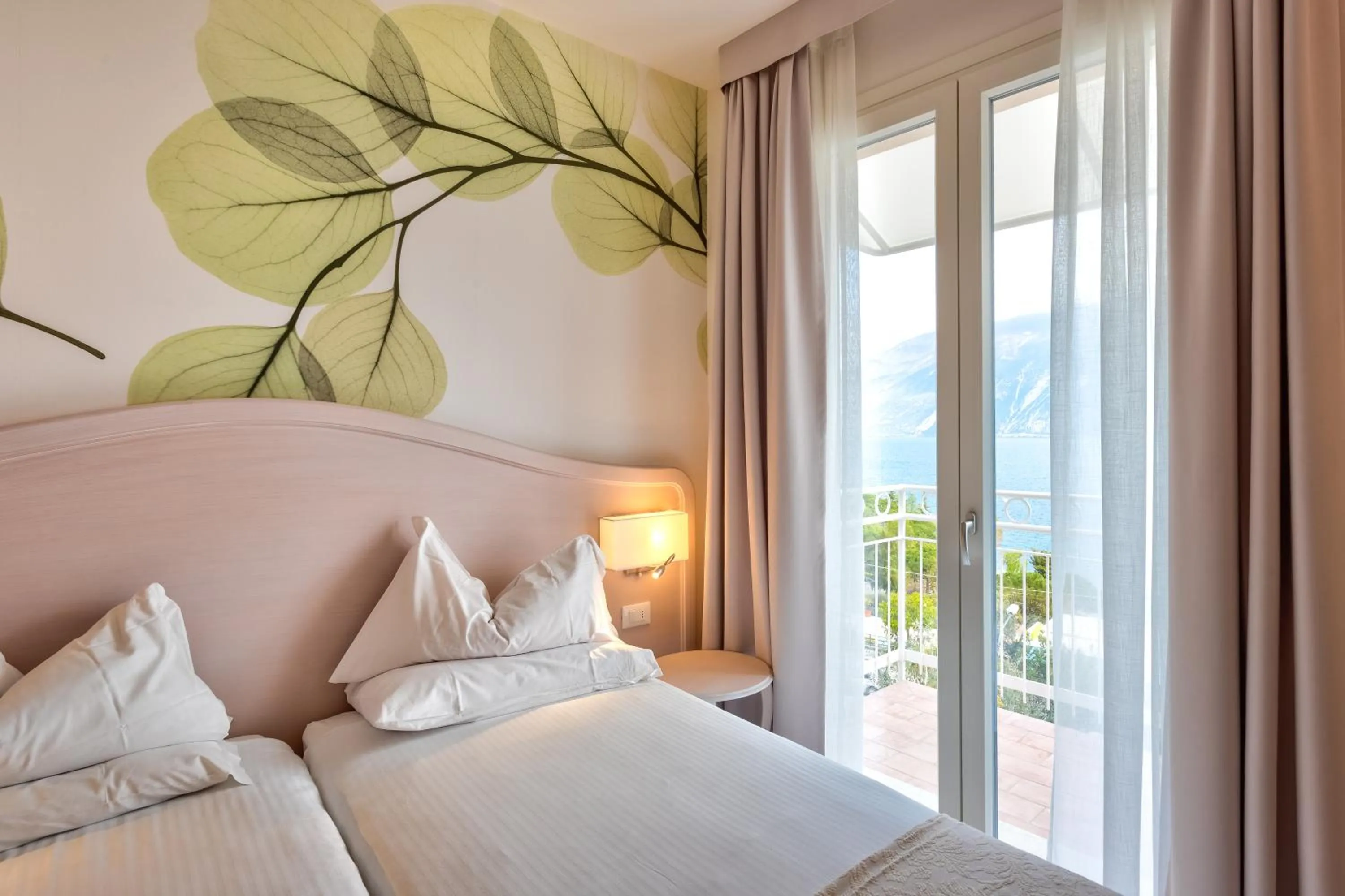 Bed in Hotel Riviera Panoramic Green Resort