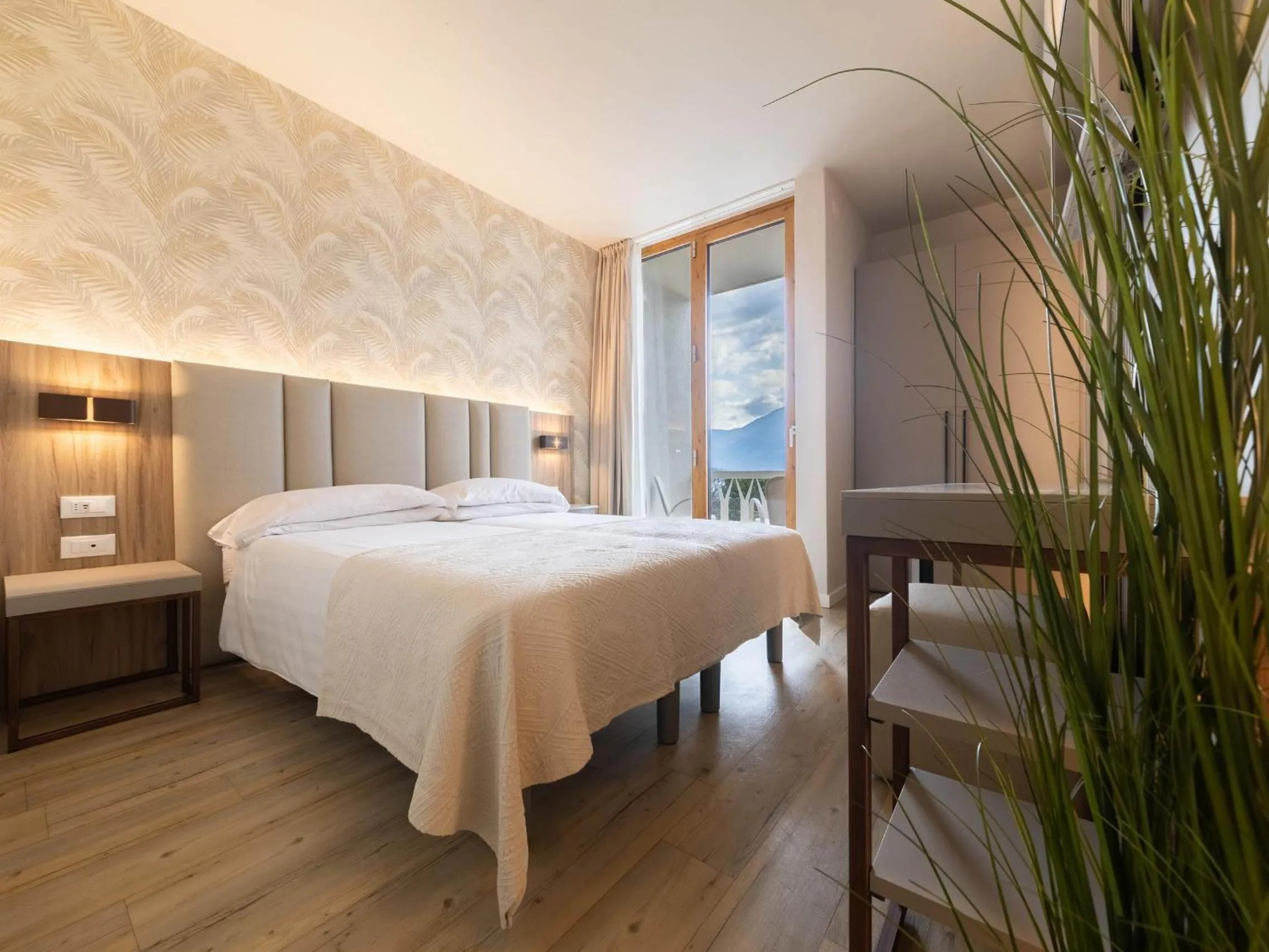 Bed in Hotel Riviera Panoramic Green Resort