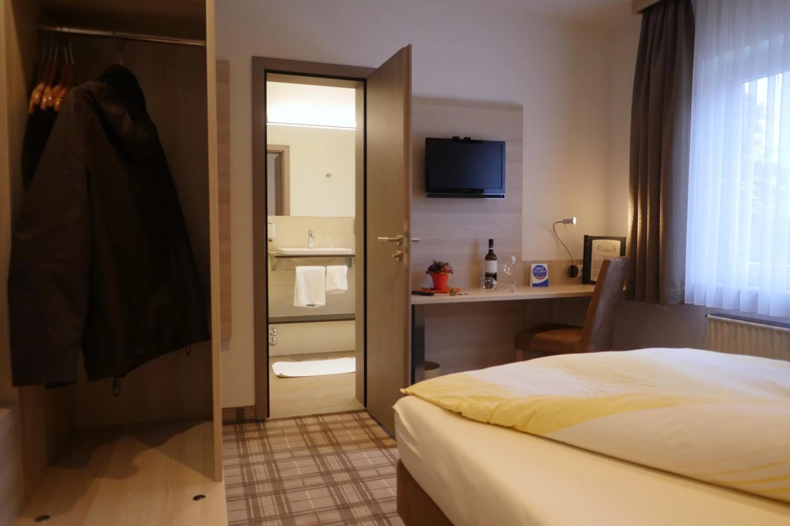 Bed in Gasthof Vossbur