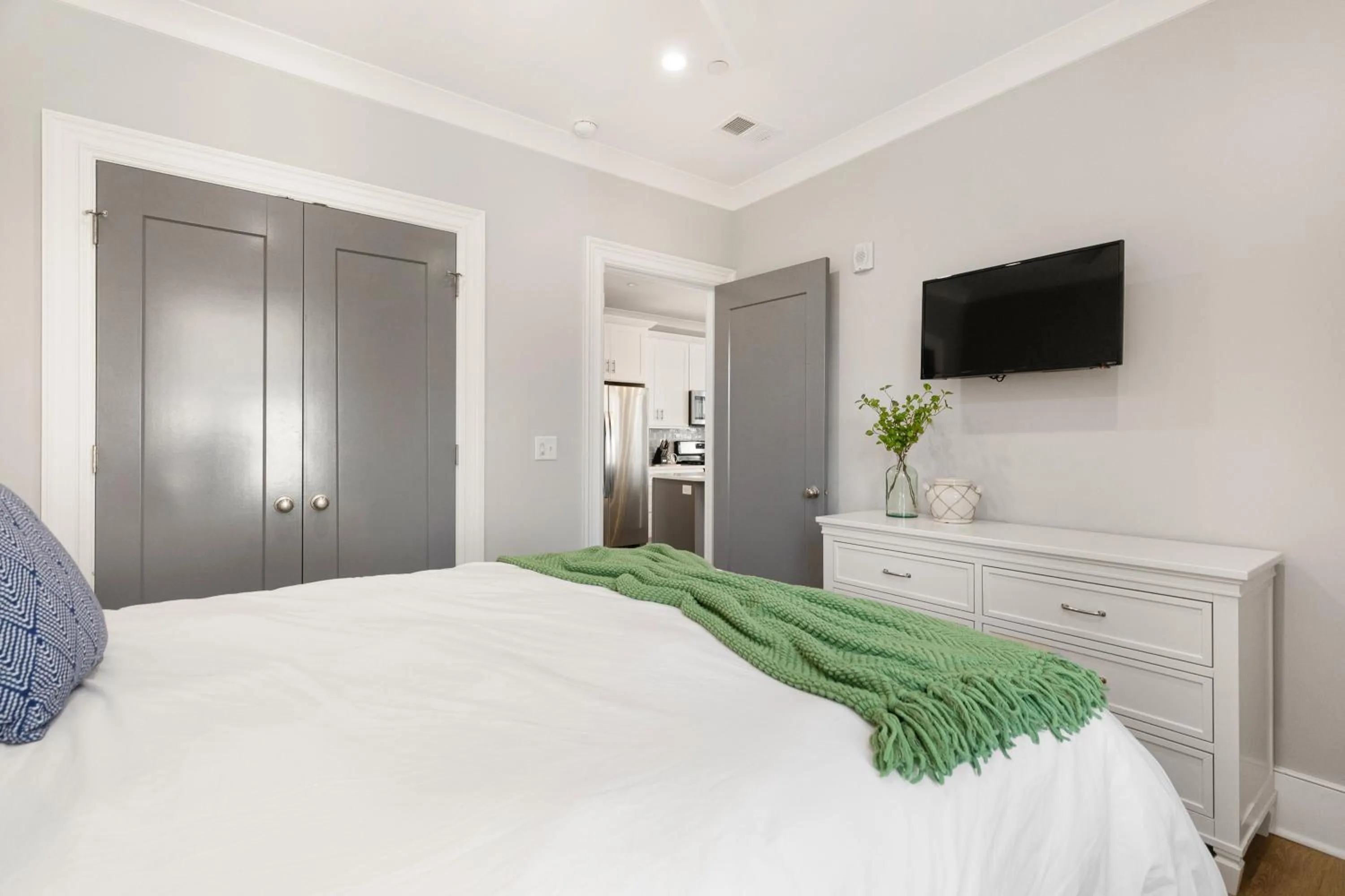 Bed in The Santee Suite at 122 Spring