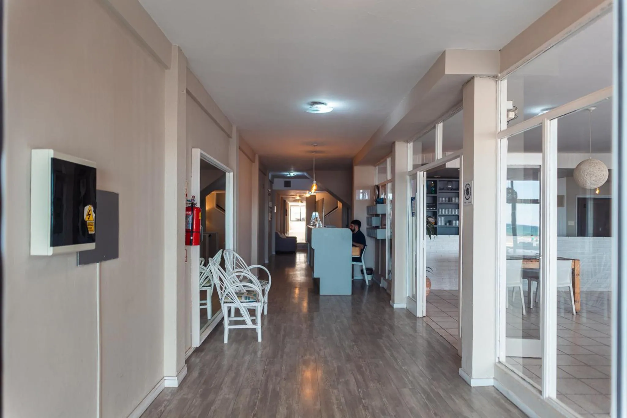 Communal lounge/ TV room in Rayentray Hostal