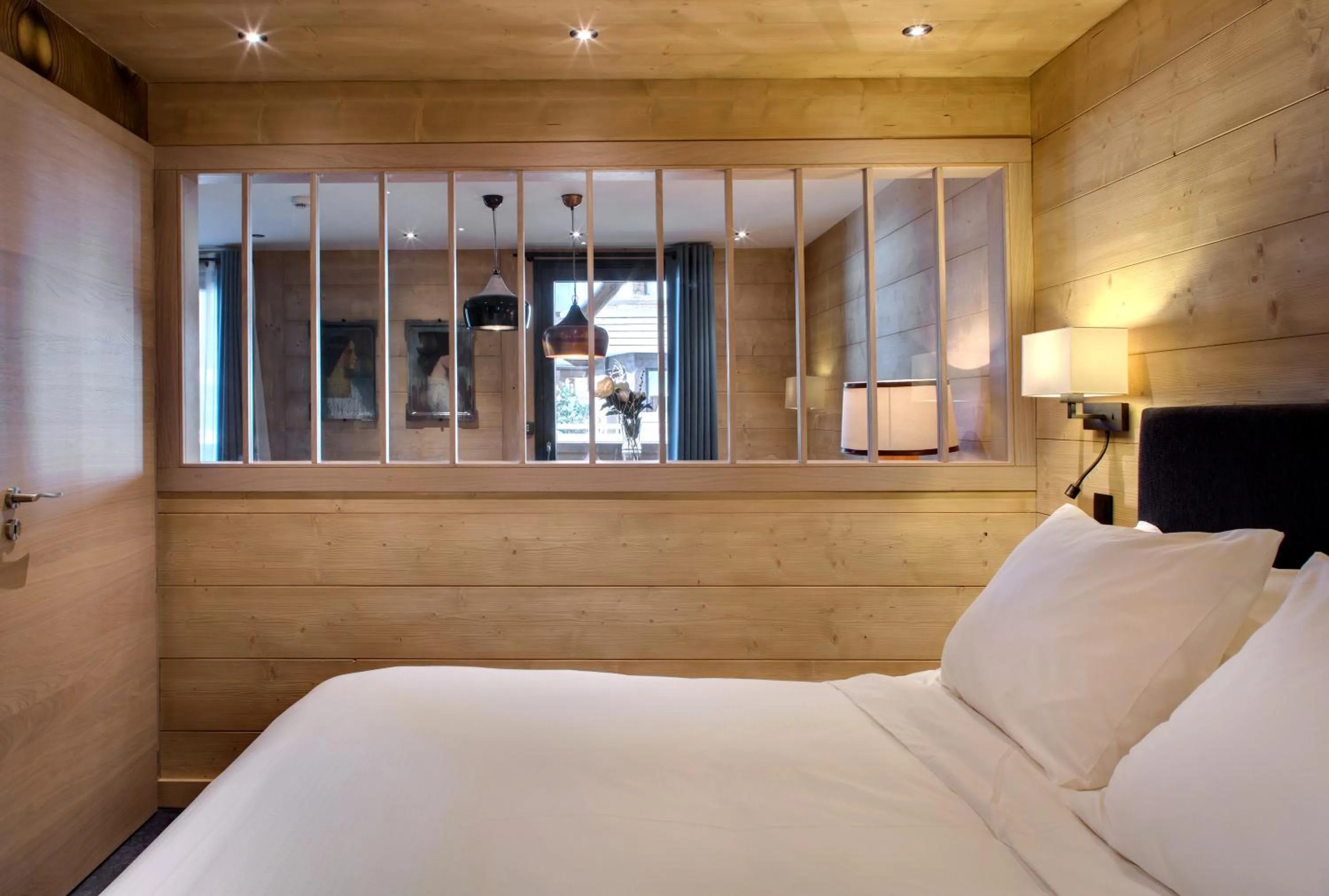 Bed in Chalet-Hôtel La Marmotte, La Tapiaz & SPA, The Originals Relais