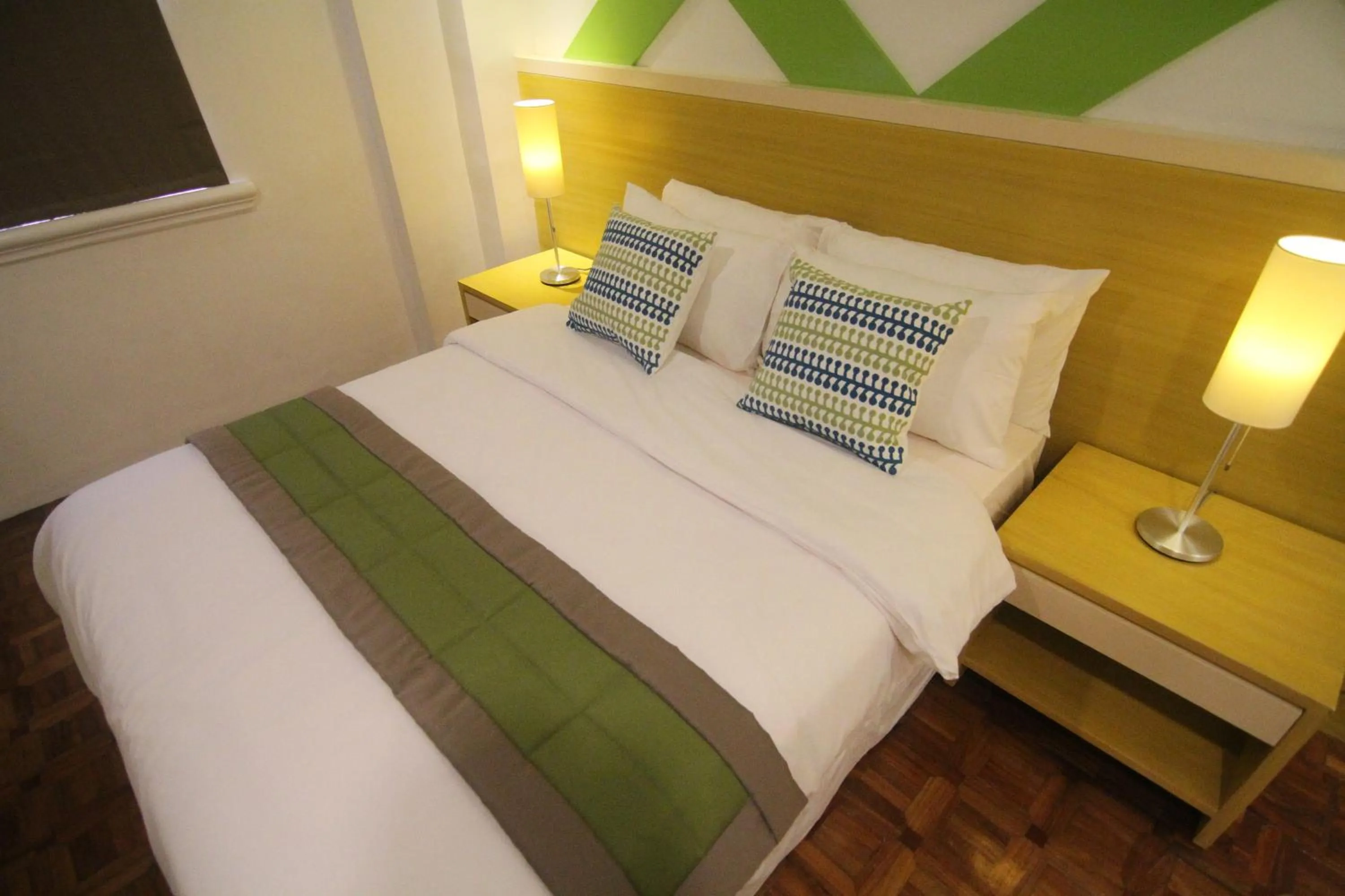 Bed in Bryan Condo Suites Makati near Airport