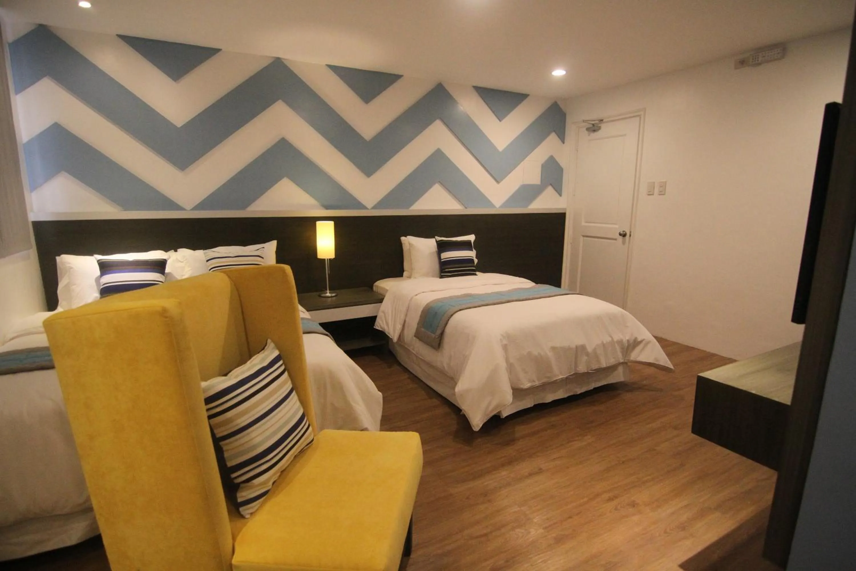 Bed in Bryan Condo Suites Makati near Airport