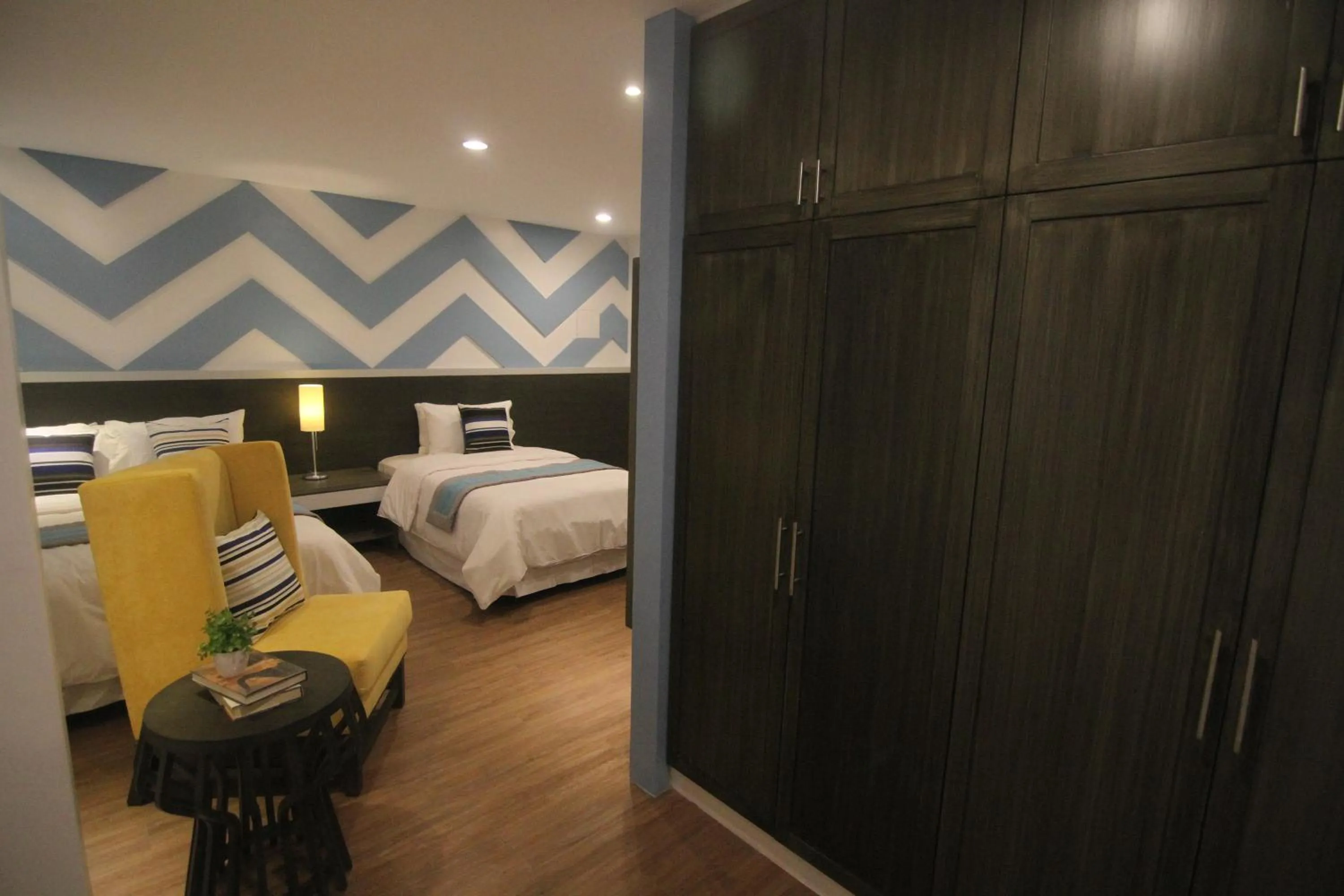 Bed in Bryan Condo Suites Makati near Airport