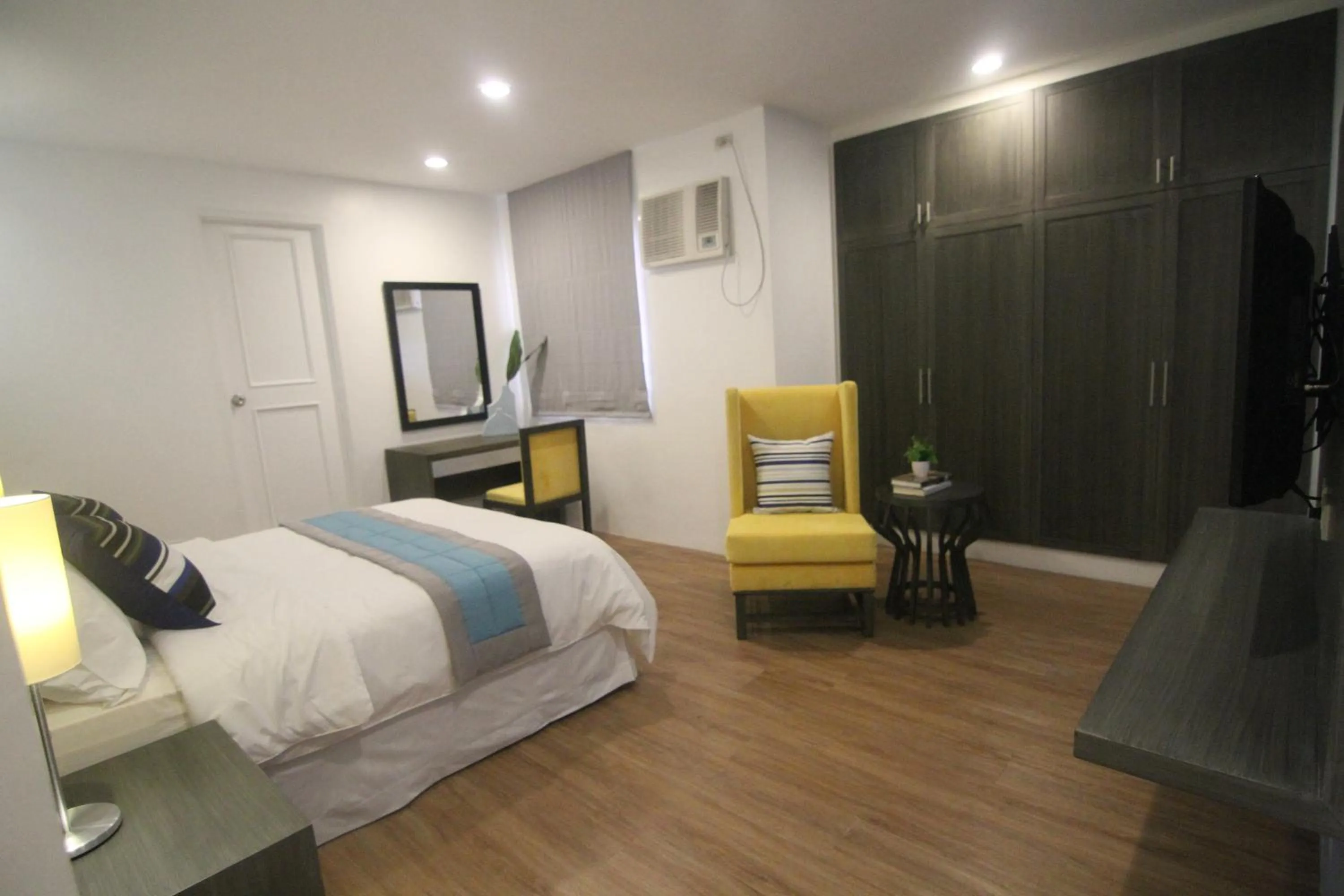 Bed in Bryan Condo Suites Makati near Airport