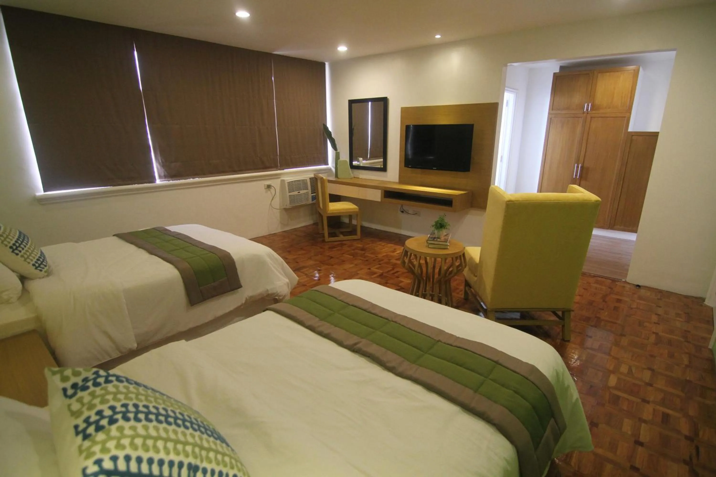 Bed in Bryan Condo Suites Makati near Airport