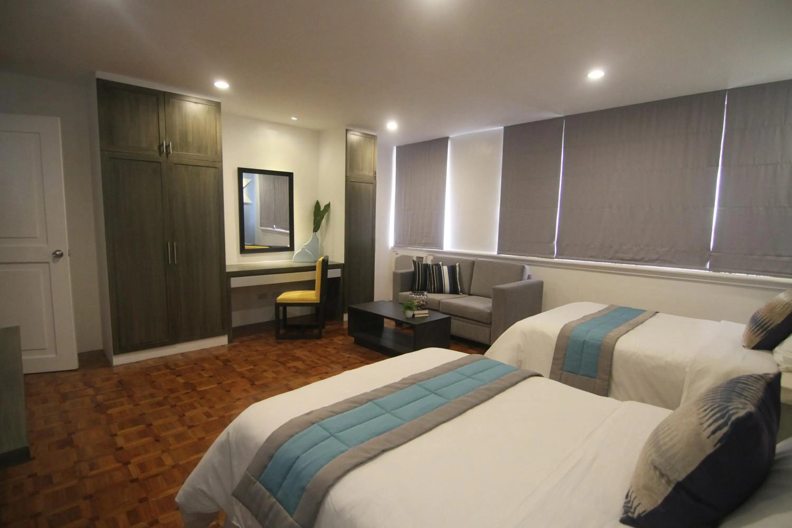 Bed in Bryan Condo Suites Makati near Airport