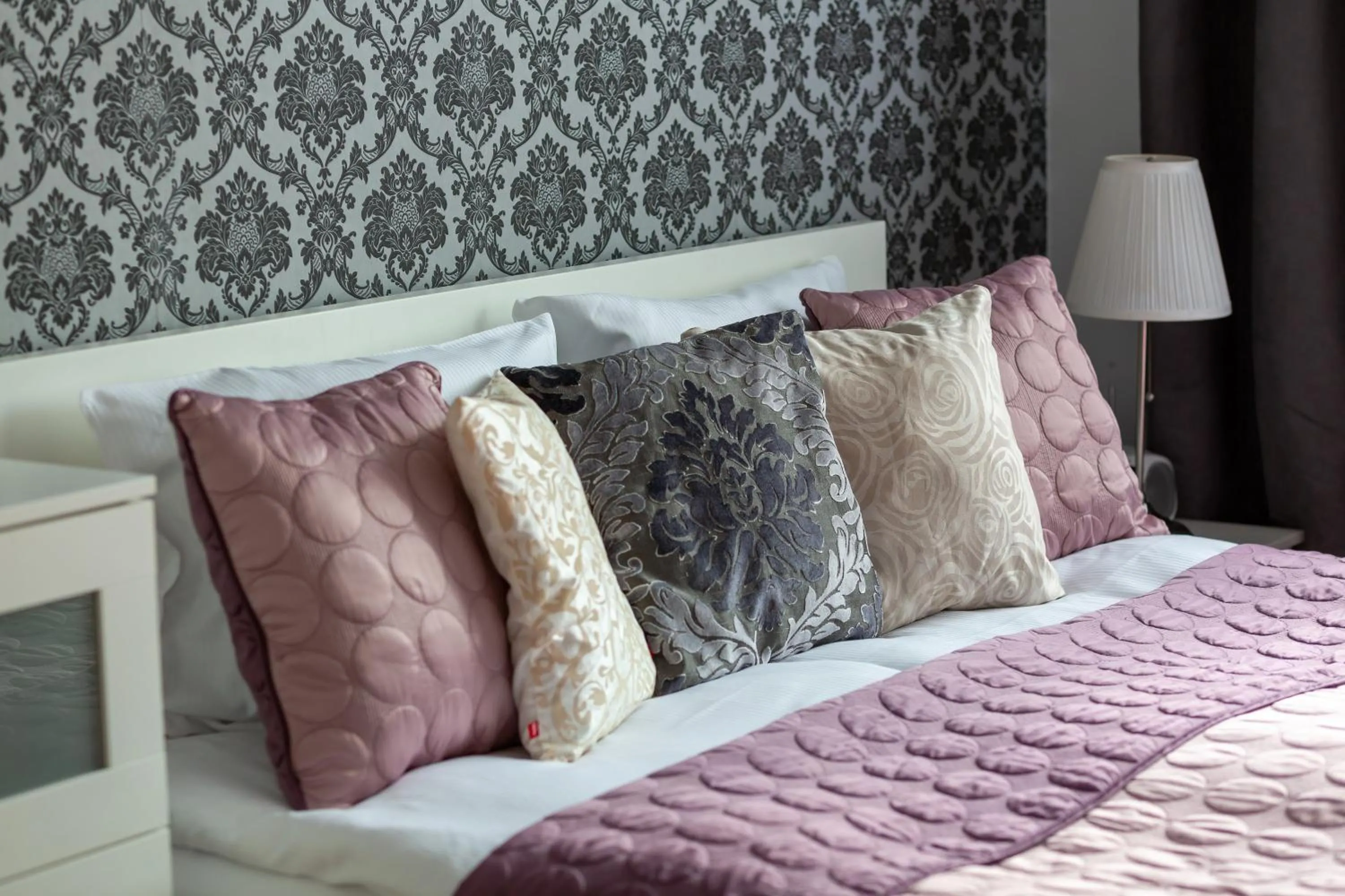 Bed in Atrium Ursus Warsaw Apartments by Noclegi Renters