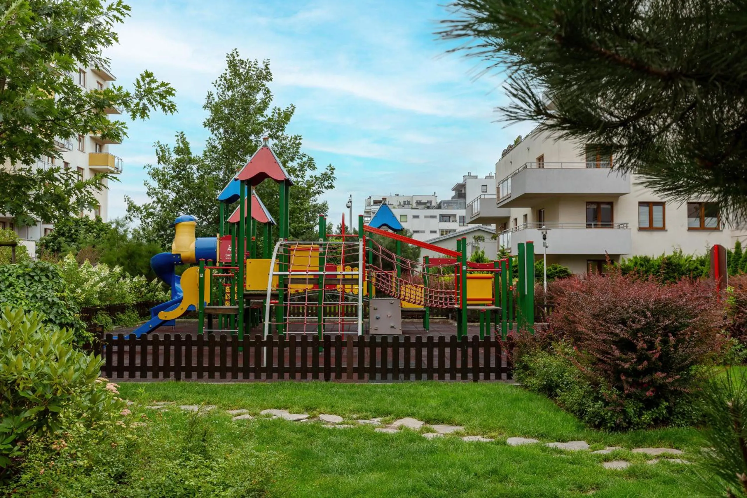 Children play ground in Atrium Ursus Warsaw Apartments by Noclegi Renters