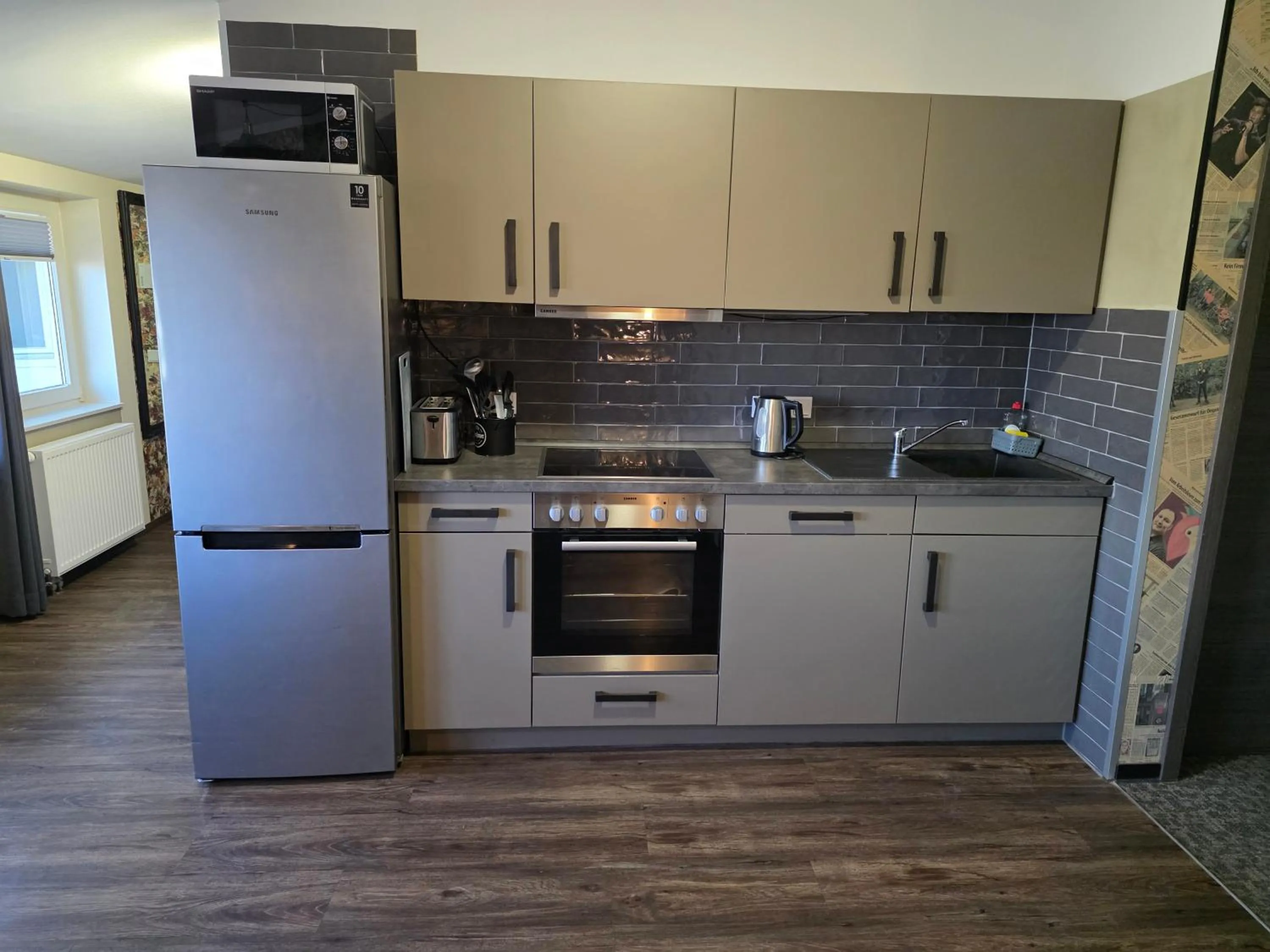 Kitchen or kitchenette in aappartel APARTHOTEL Herford