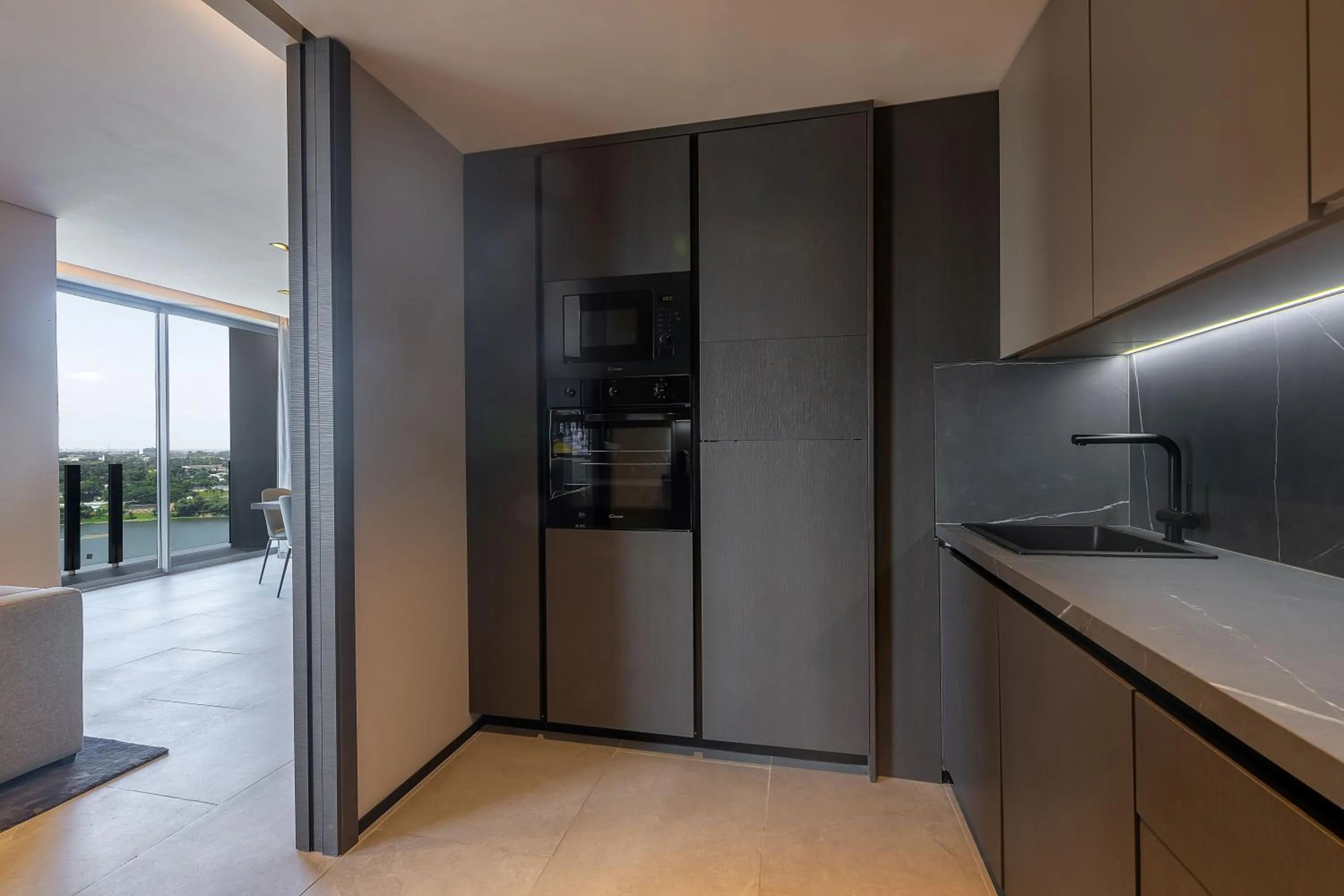 Kitchen or kitchenette in Noom Hotel Abidjan Plateau