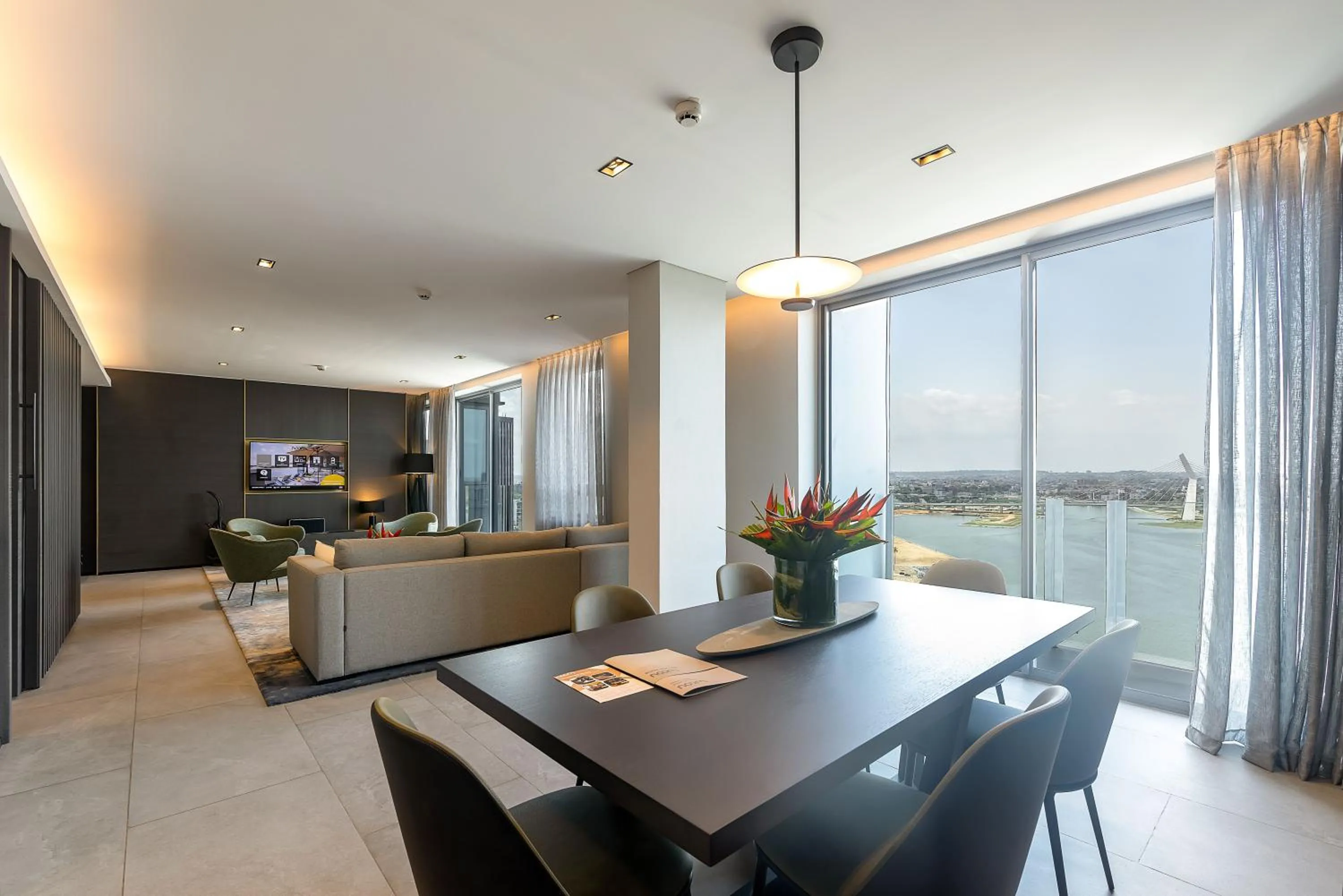 Communal lounge/ TV room in Noom Hotel Abidjan Plateau