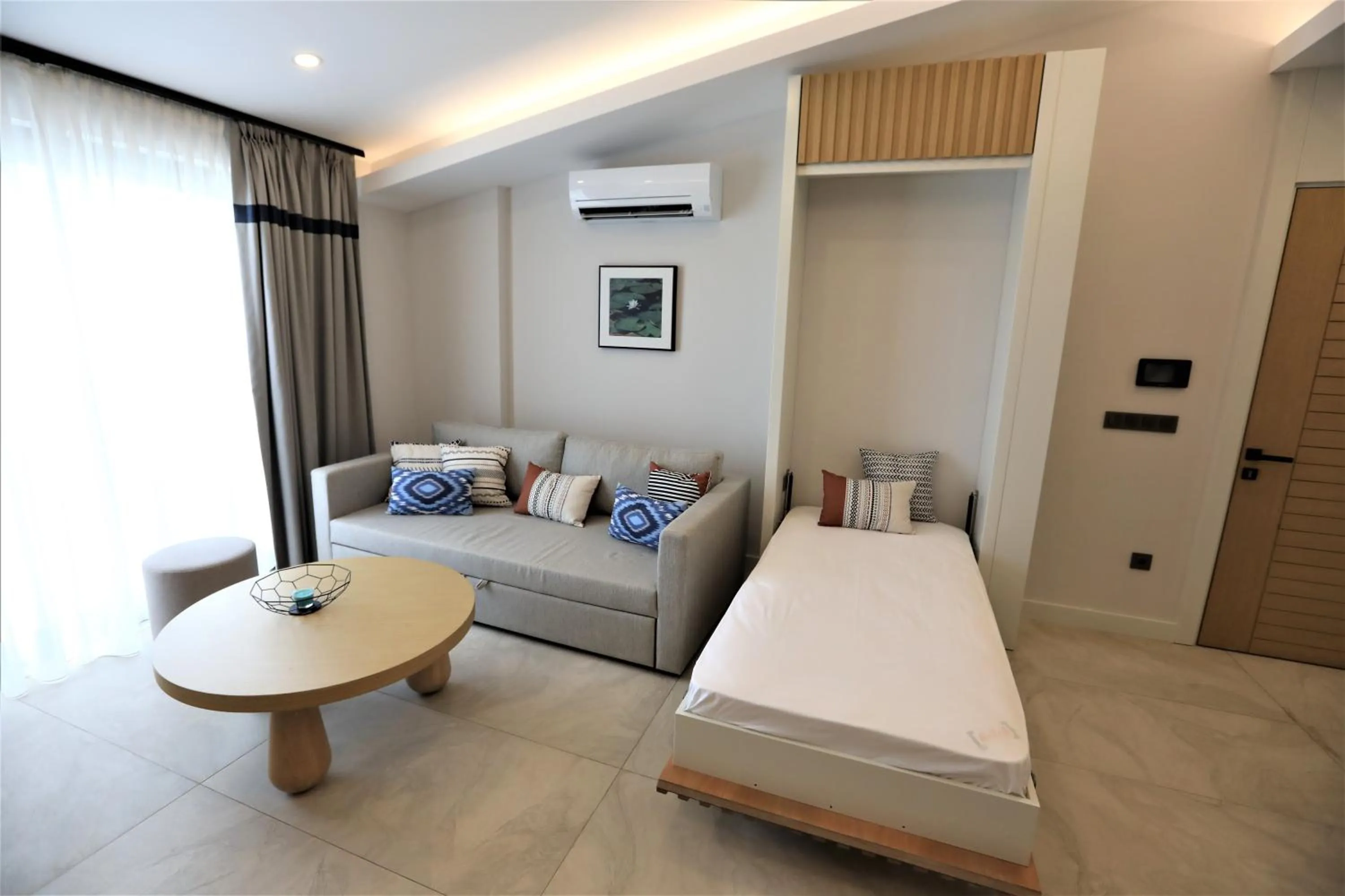 Living room, Bed in A Suite Side