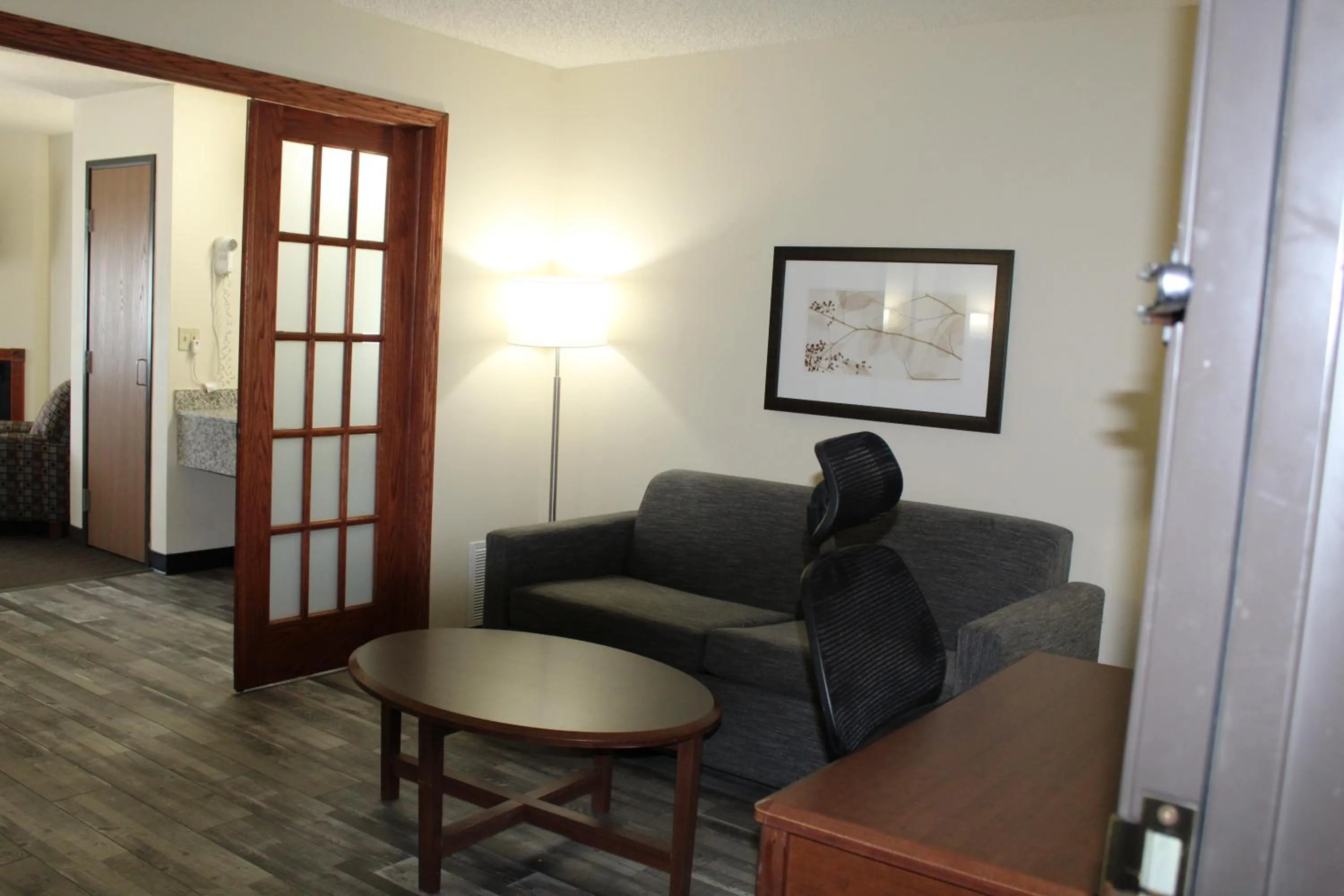 Living room in AmericInn by Wyndham Windsor Ft. Collins