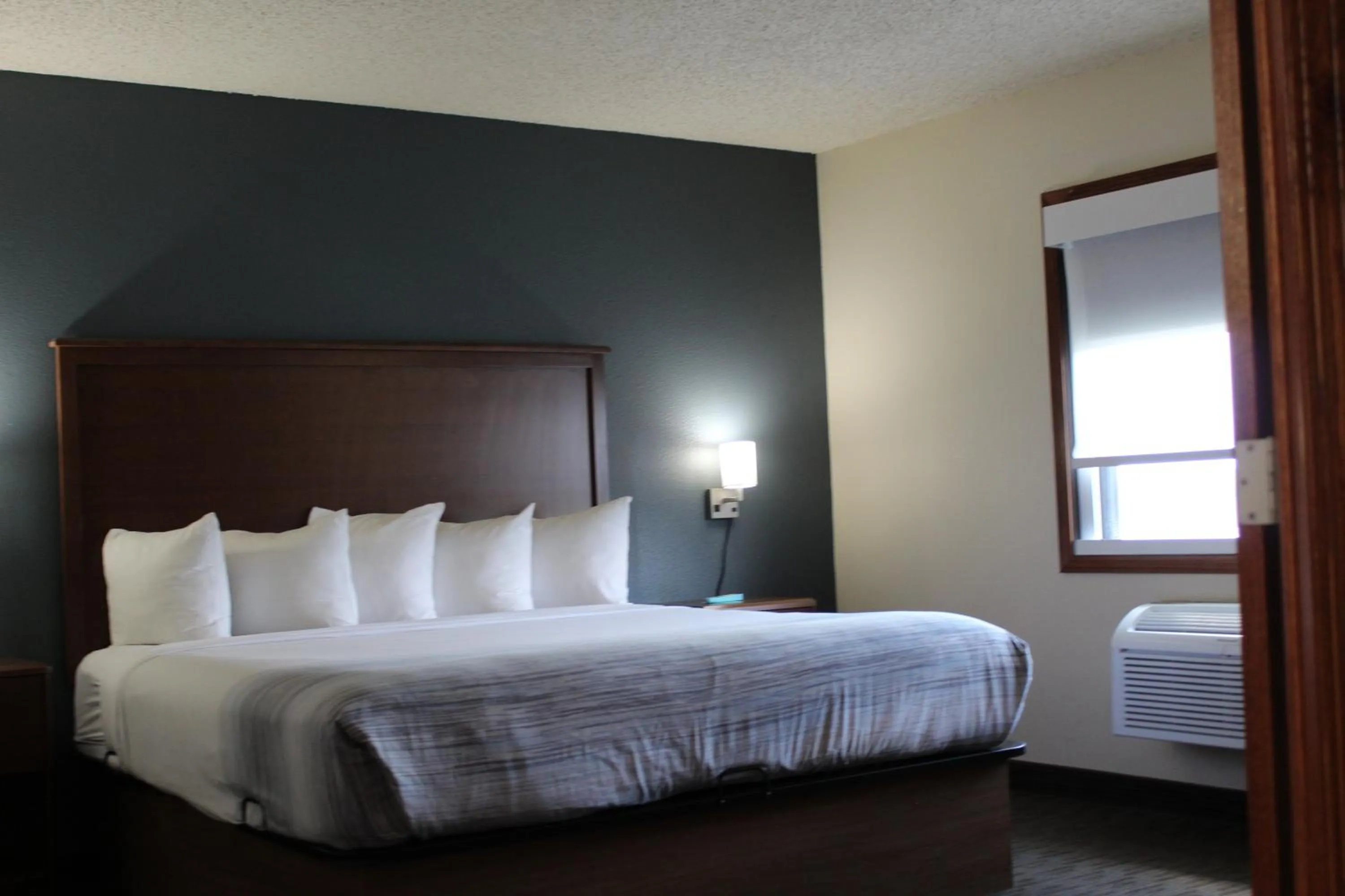 Bed in AmericInn by Wyndham Windsor Ft. Collins