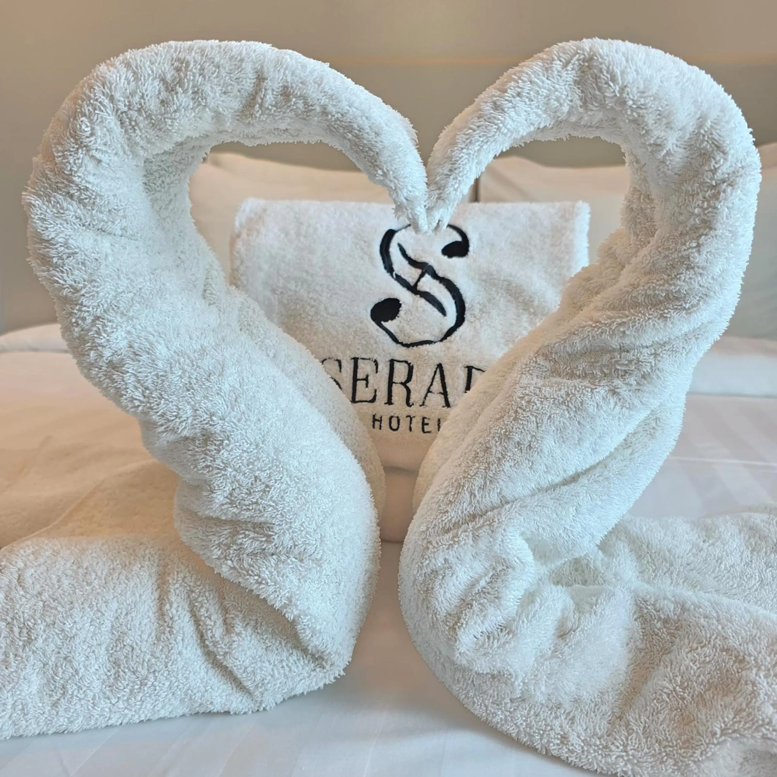 towels, Bed in Serapi Verdure Hotel