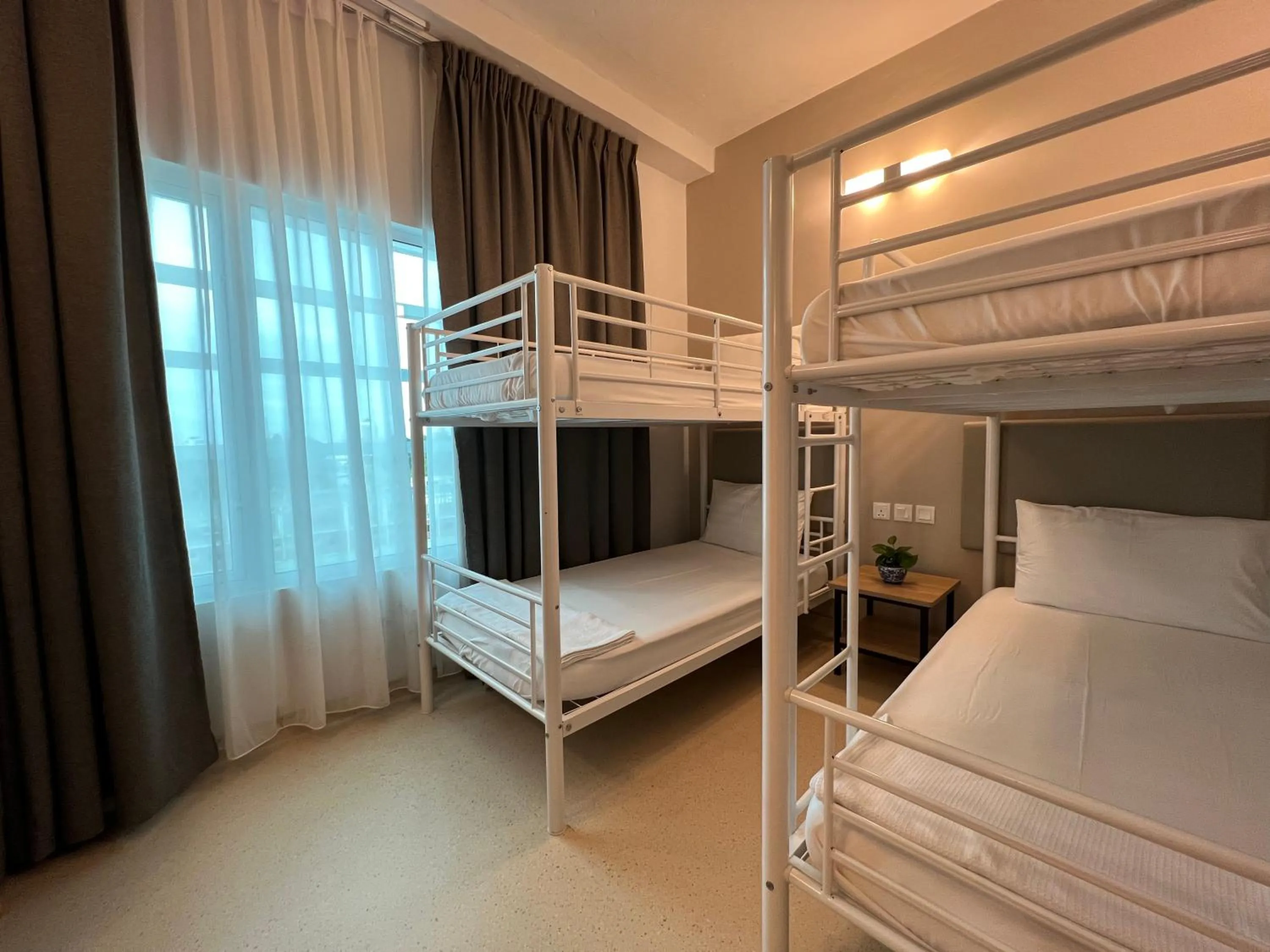 4-Bed Mixed Dormitory Room in Serapi Verdure Hotel