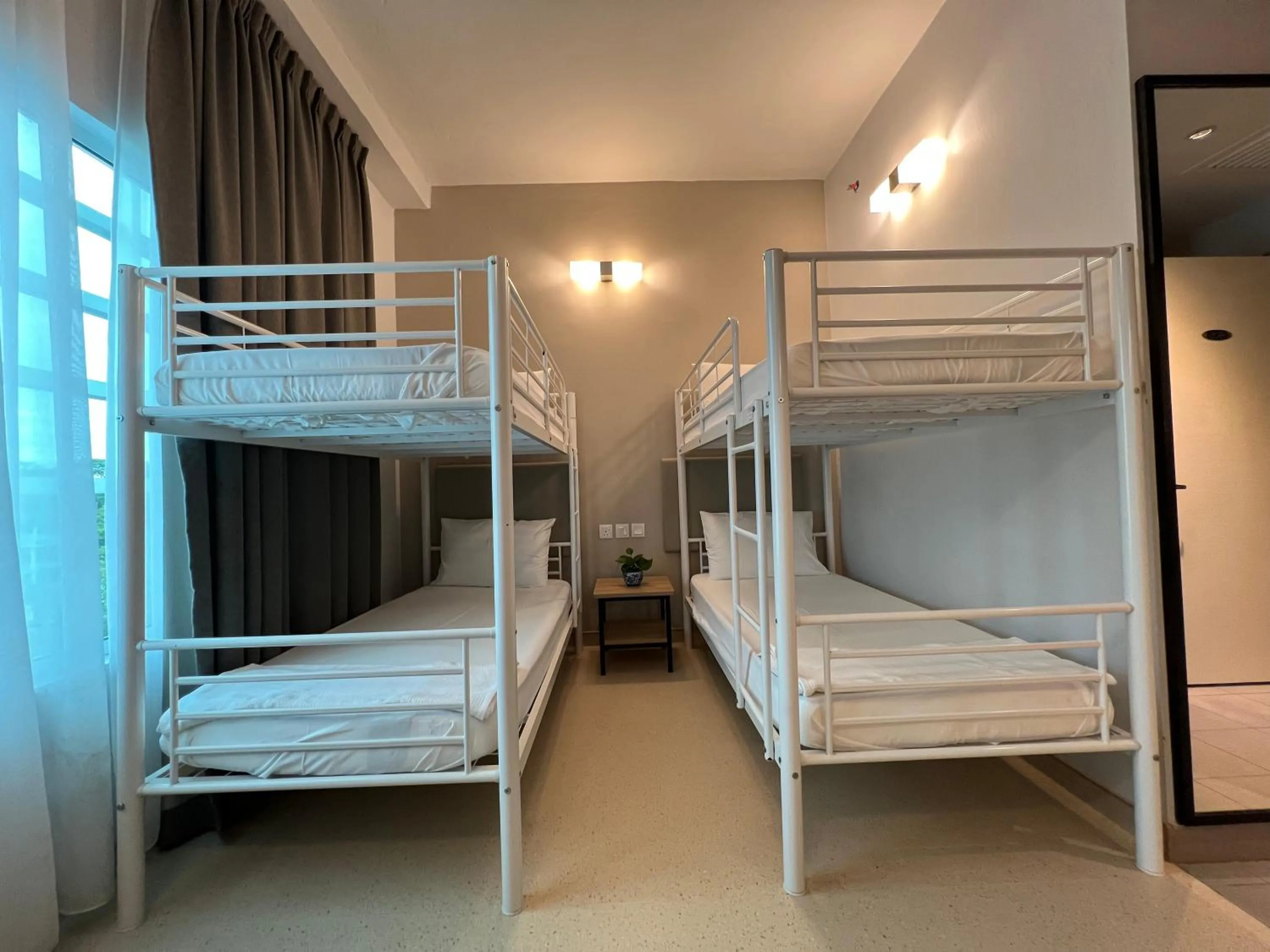 Bed in Serapi Verdure Hotel