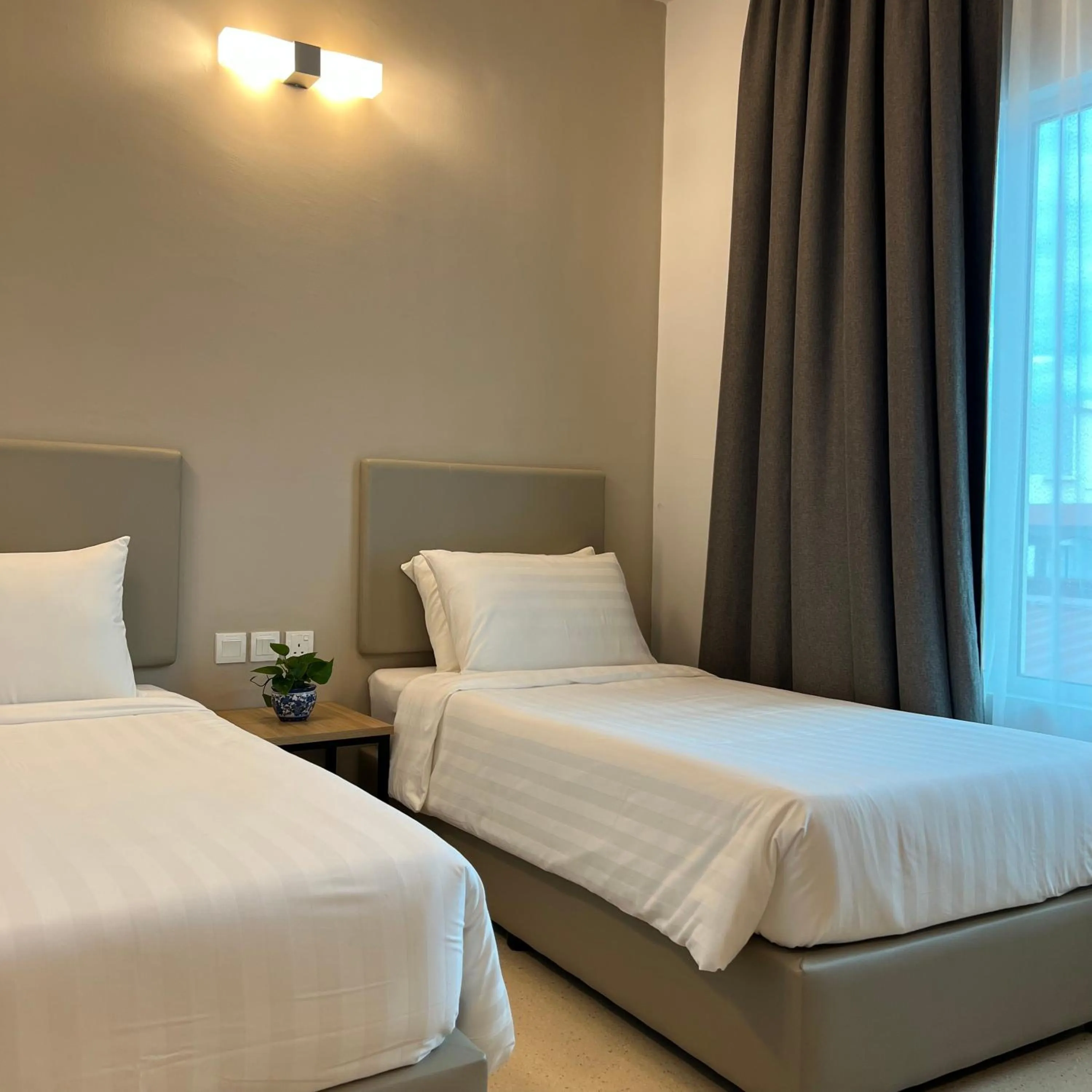 Bed in Serapi Verdure Hotel