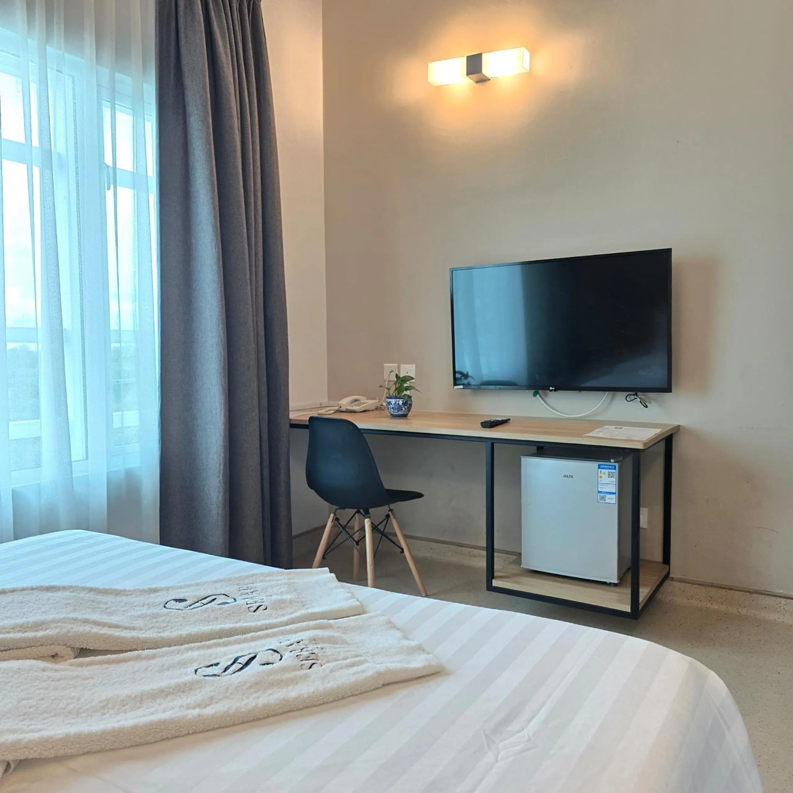 TV and multimedia, Bed in Serapi Verdure Hotel