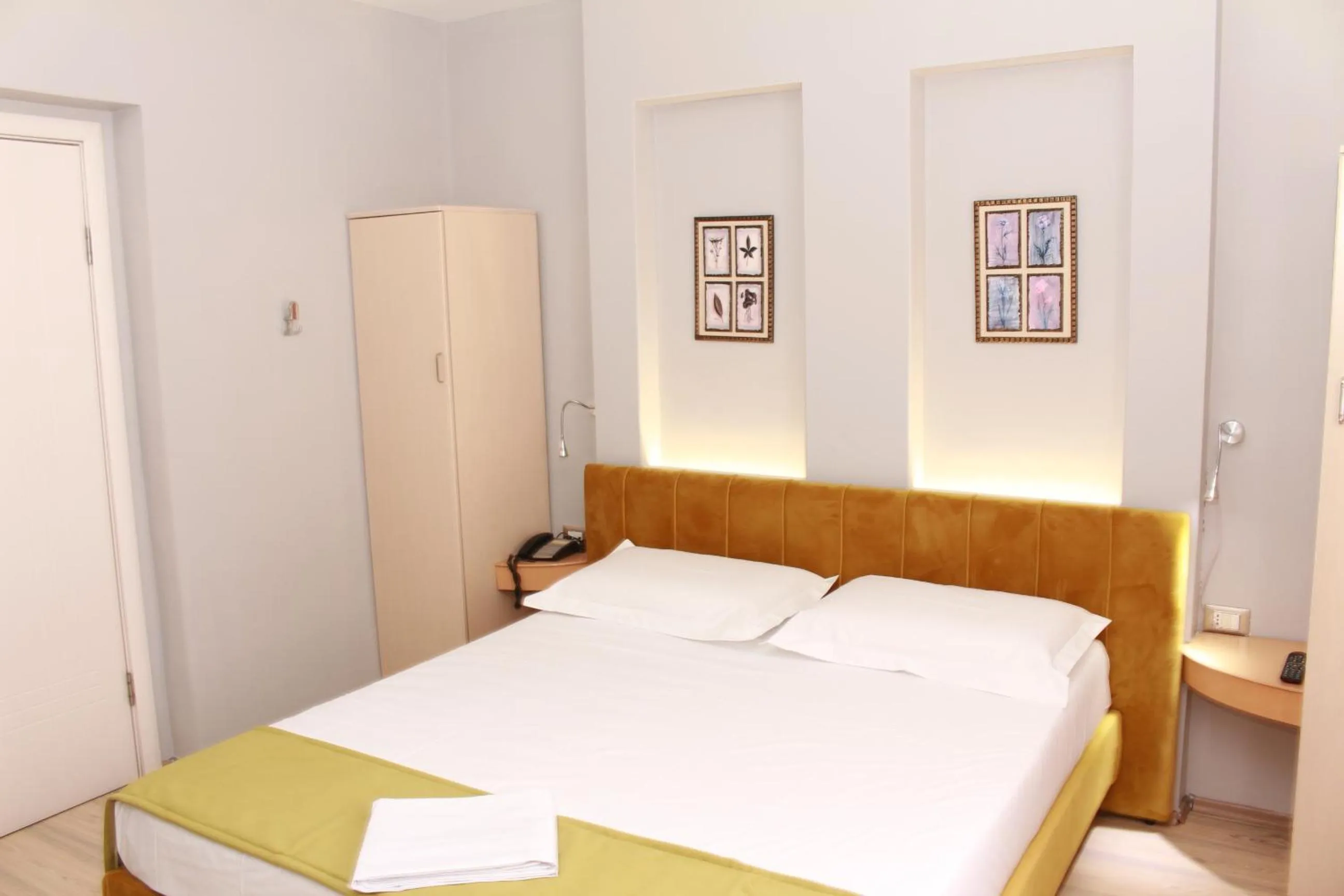 Bed in Theranda Boutique Hotel