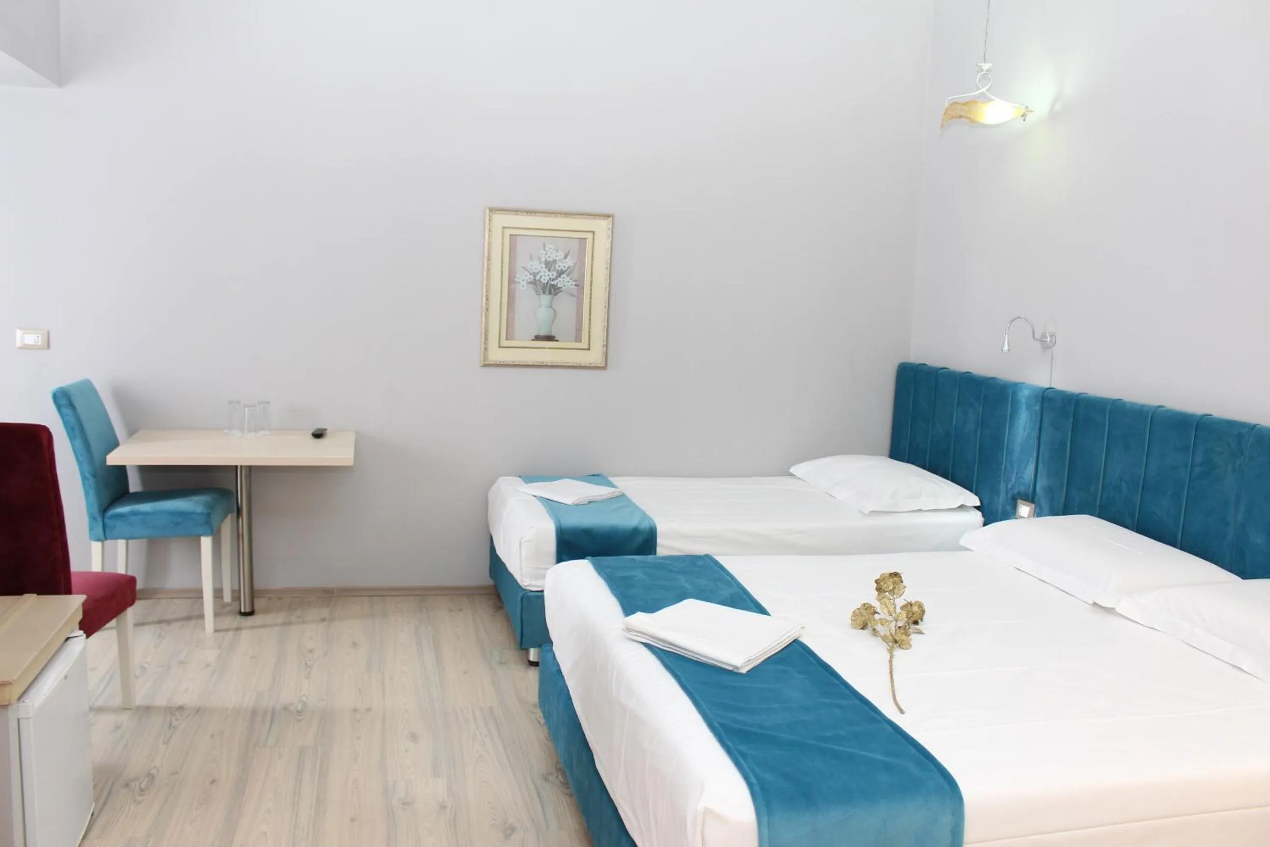 Bed in Theranda Boutique Hotel