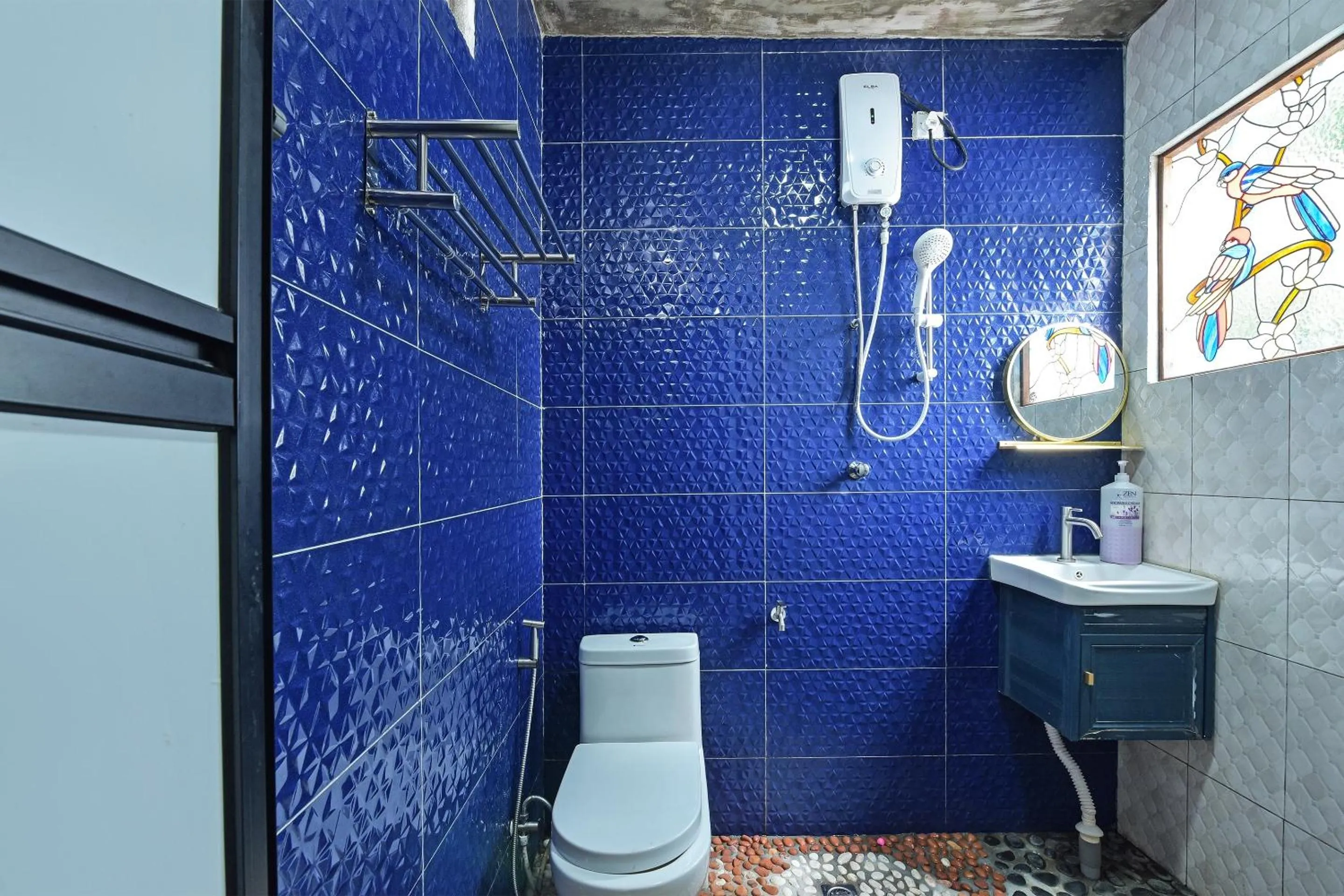 Bathroom in Hotel O Jentayu Homestay Pontian