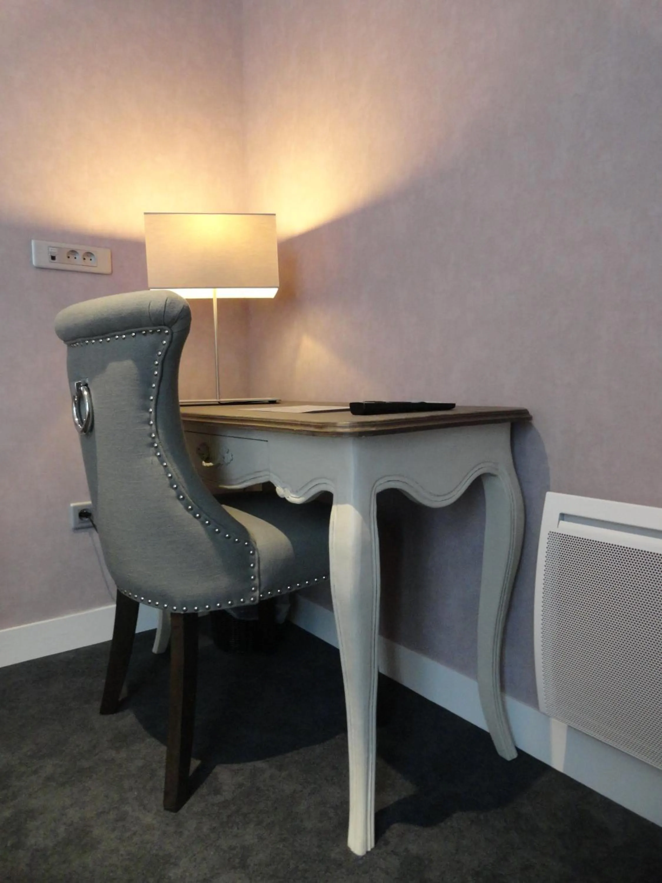 Seating area in Hotel Le Lion D'Or et Restaurant La Table Du Lion