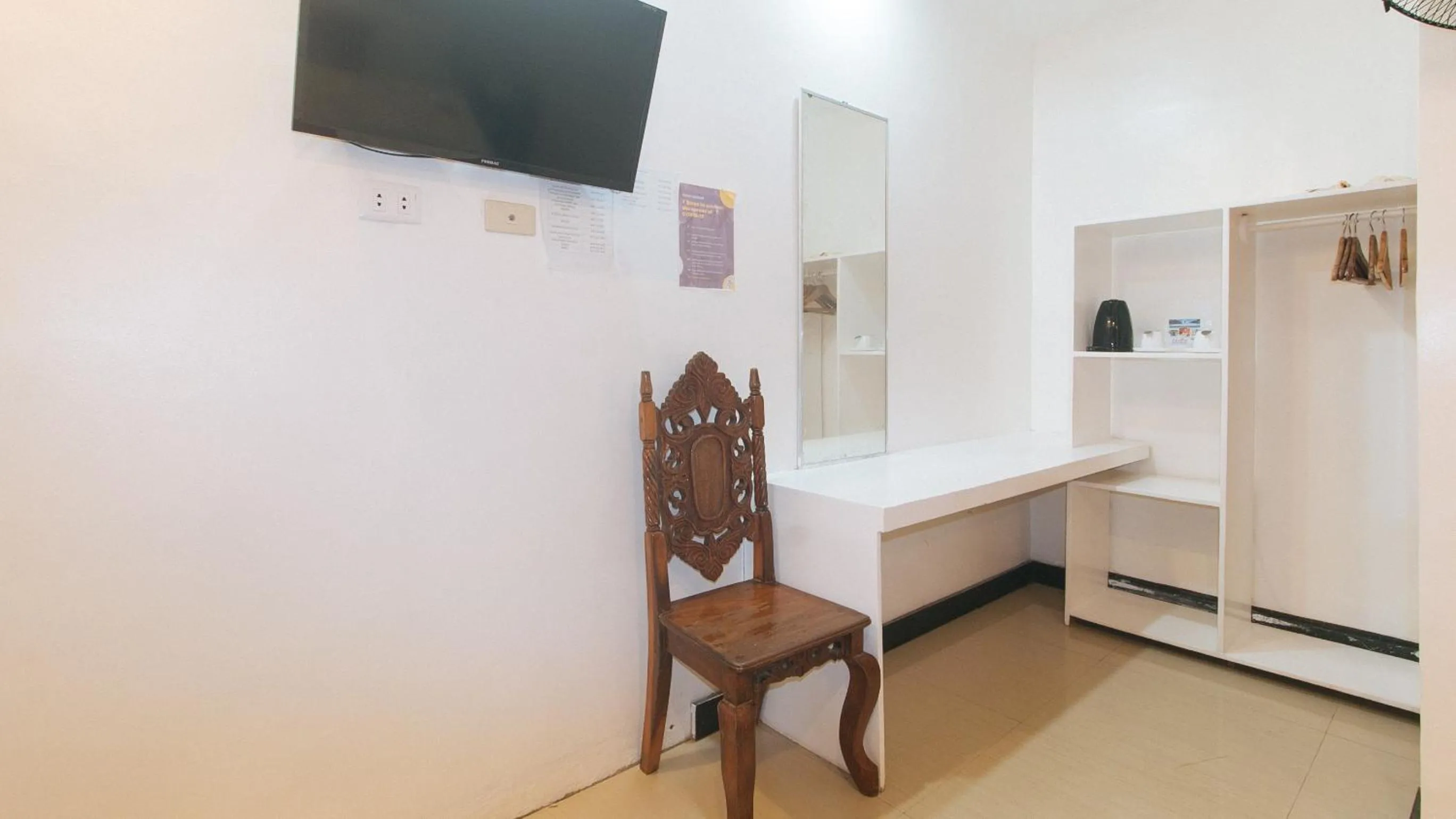 TV and multimedia in RedDoorz @ Lualhati Garden Cottage El Nido Palawan