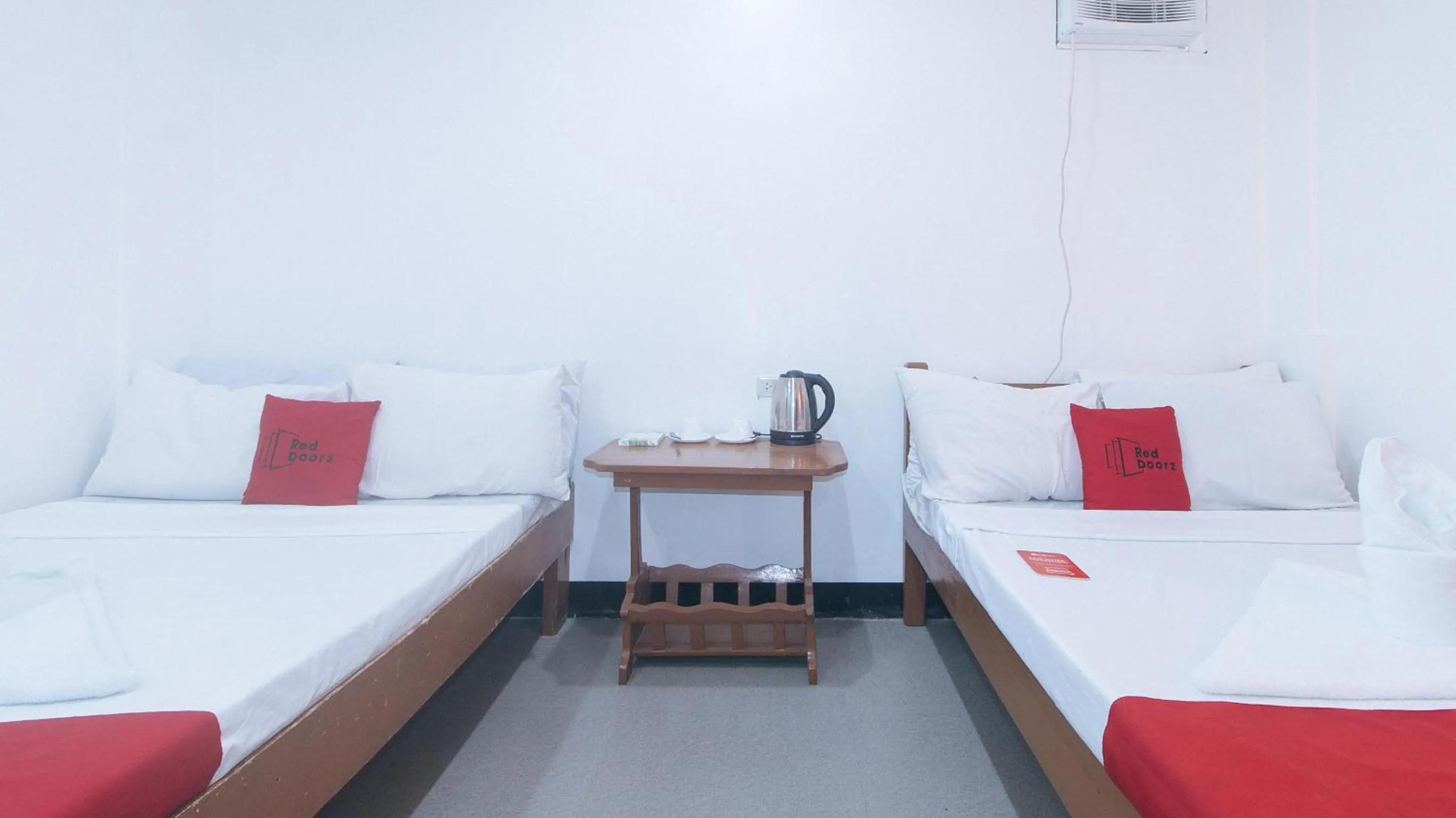 Bed in RedDoorz @ Lualhati Garden Cottage El Nido Palawan