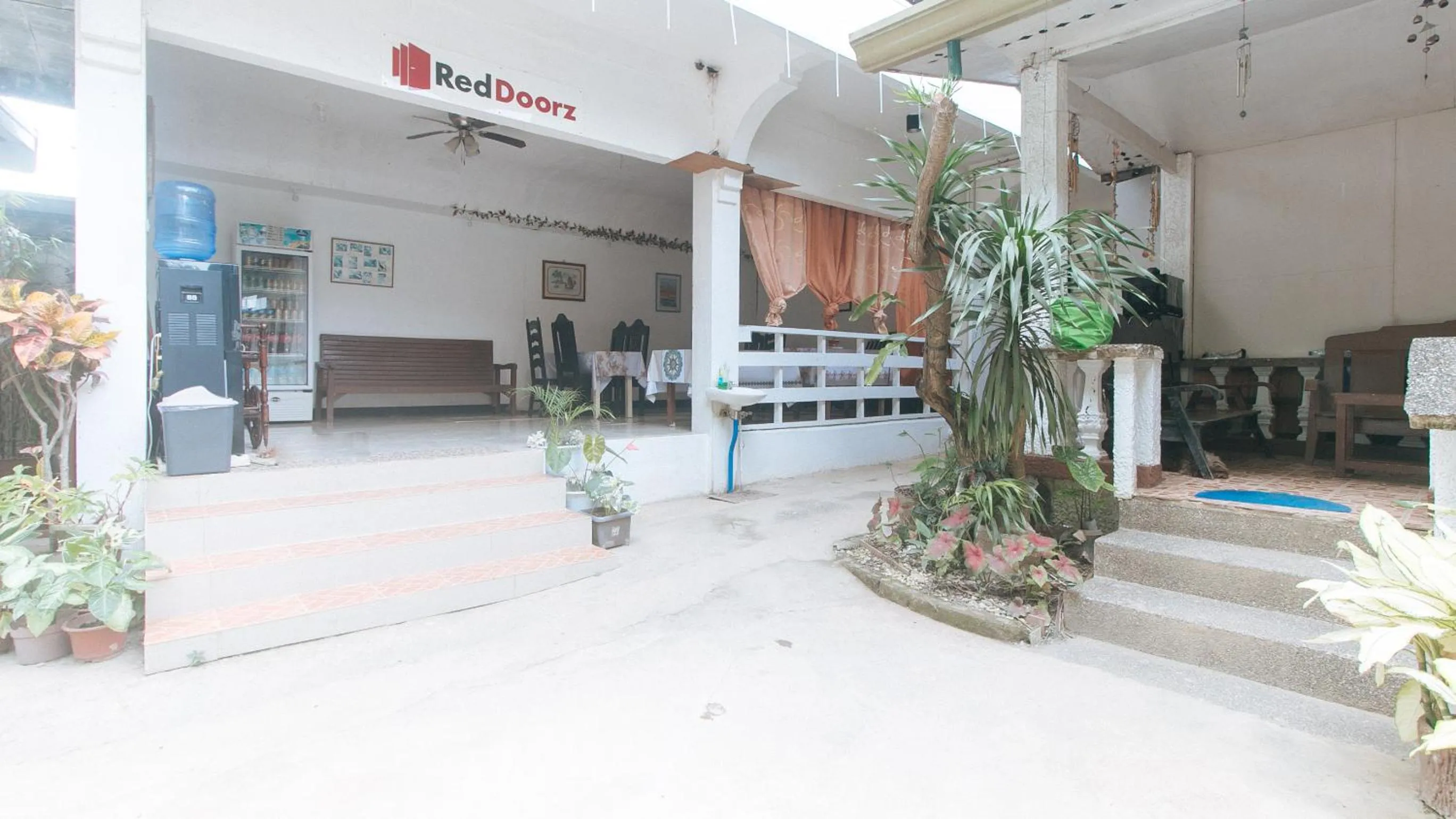 Facade/entrance in RedDoorz @ Lualhati Garden Cottage El Nido Palawan