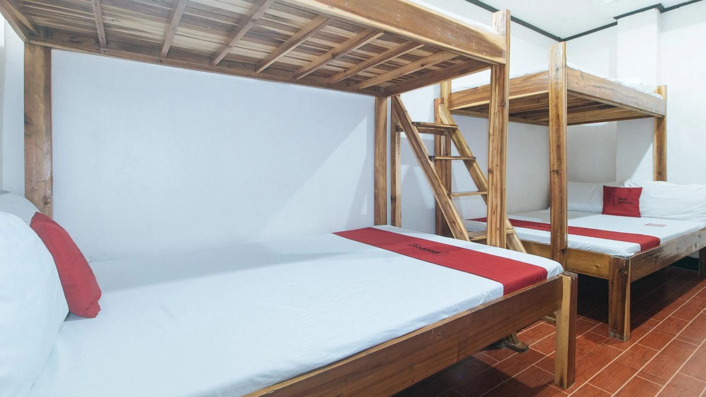 Bed in RedDoorz @ Lualhati Garden Cottage El Nido Palawan